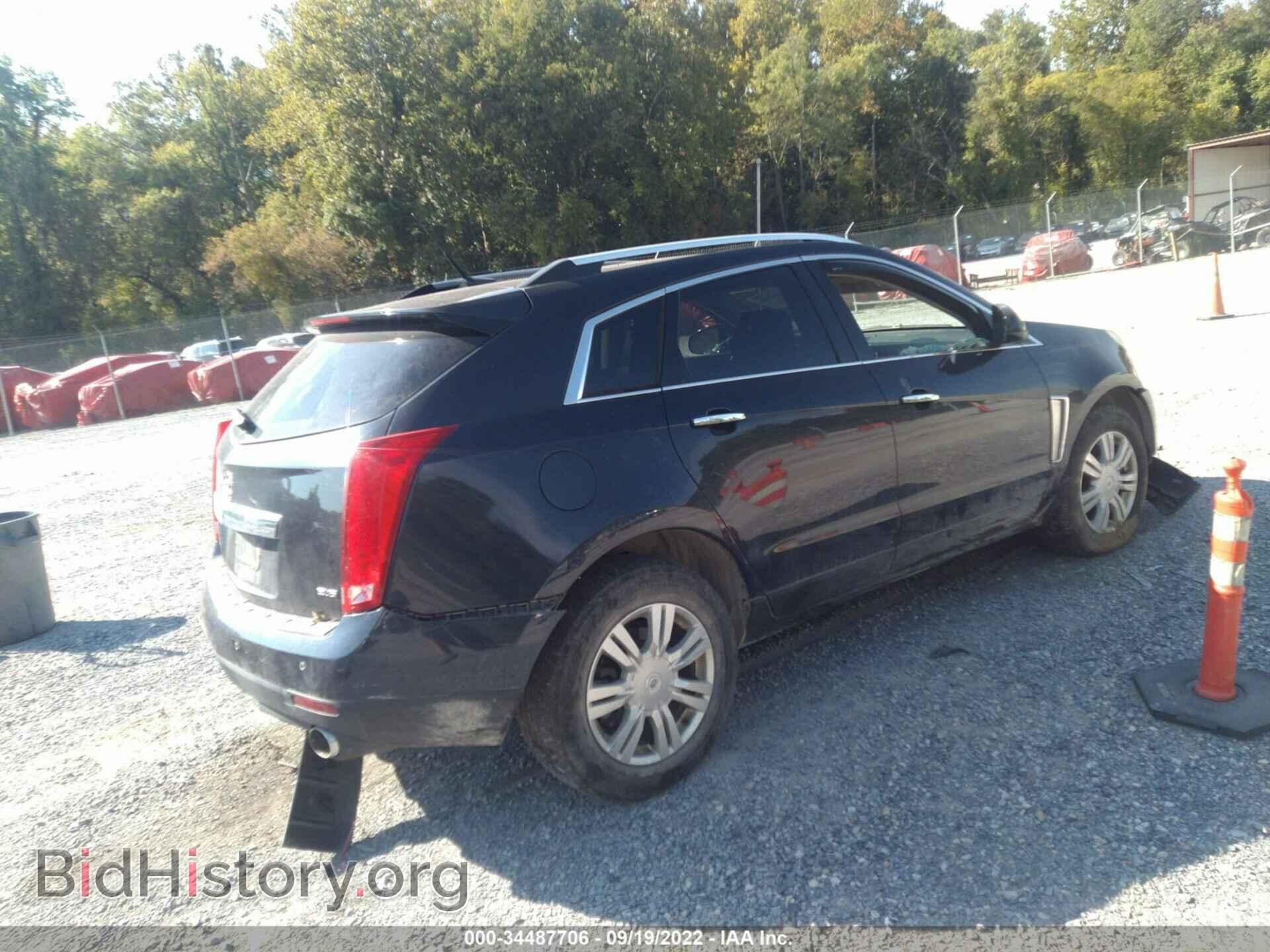 2014 CADILLAC SRX - VIN: 3GYFNEE36ES521066 - Фото 4