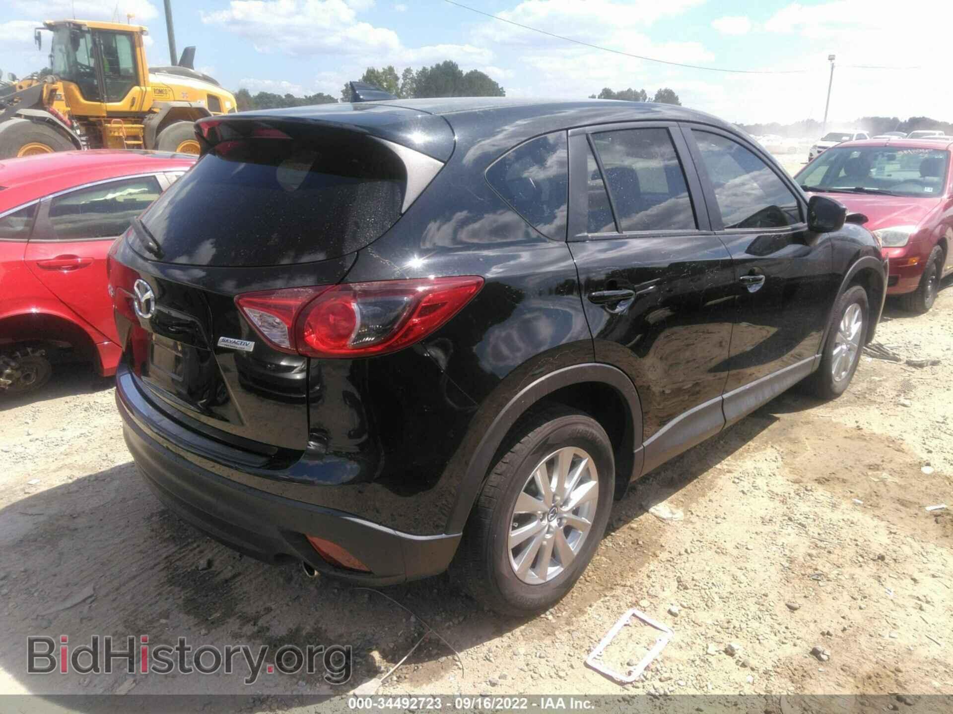 2016 MAZDA CX-5 - VIN: JM3KE2CY2G0673350 - Фото 4