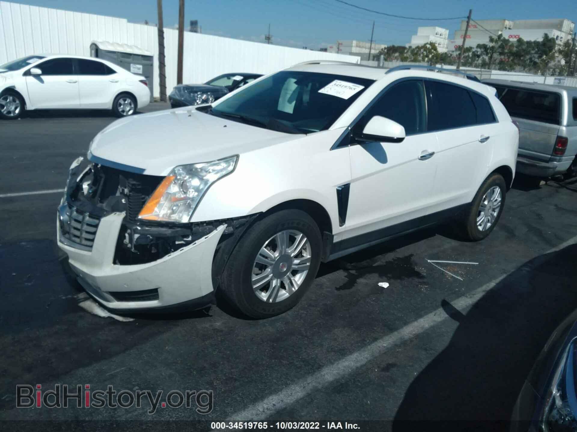 2014 CADILLAC SRX - VIN: 3GYFNBE3XES632539 - Фото 2