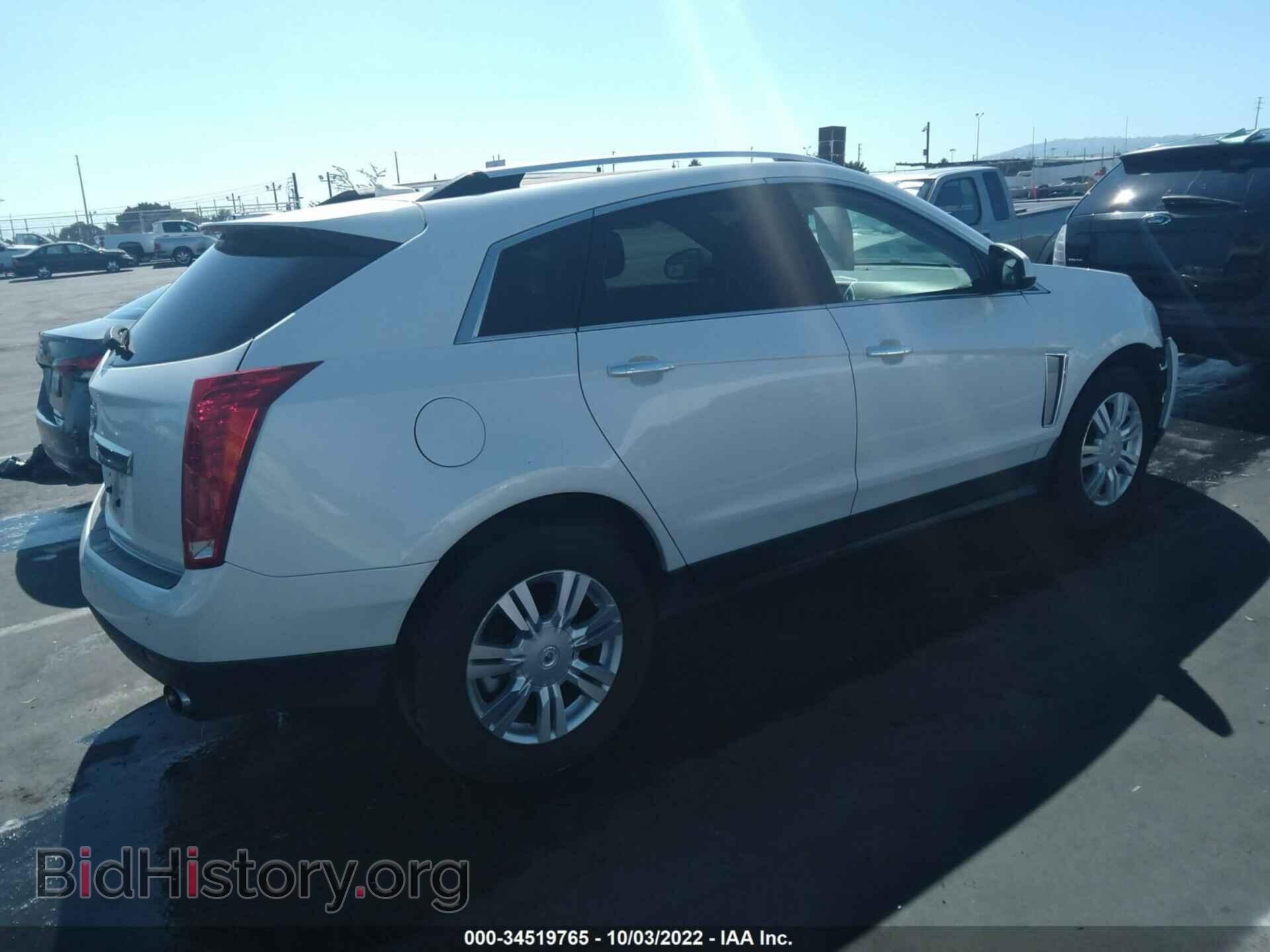 2014 CADILLAC SRX - VIN: 3GYFNBE3XES632539 - Фото 4