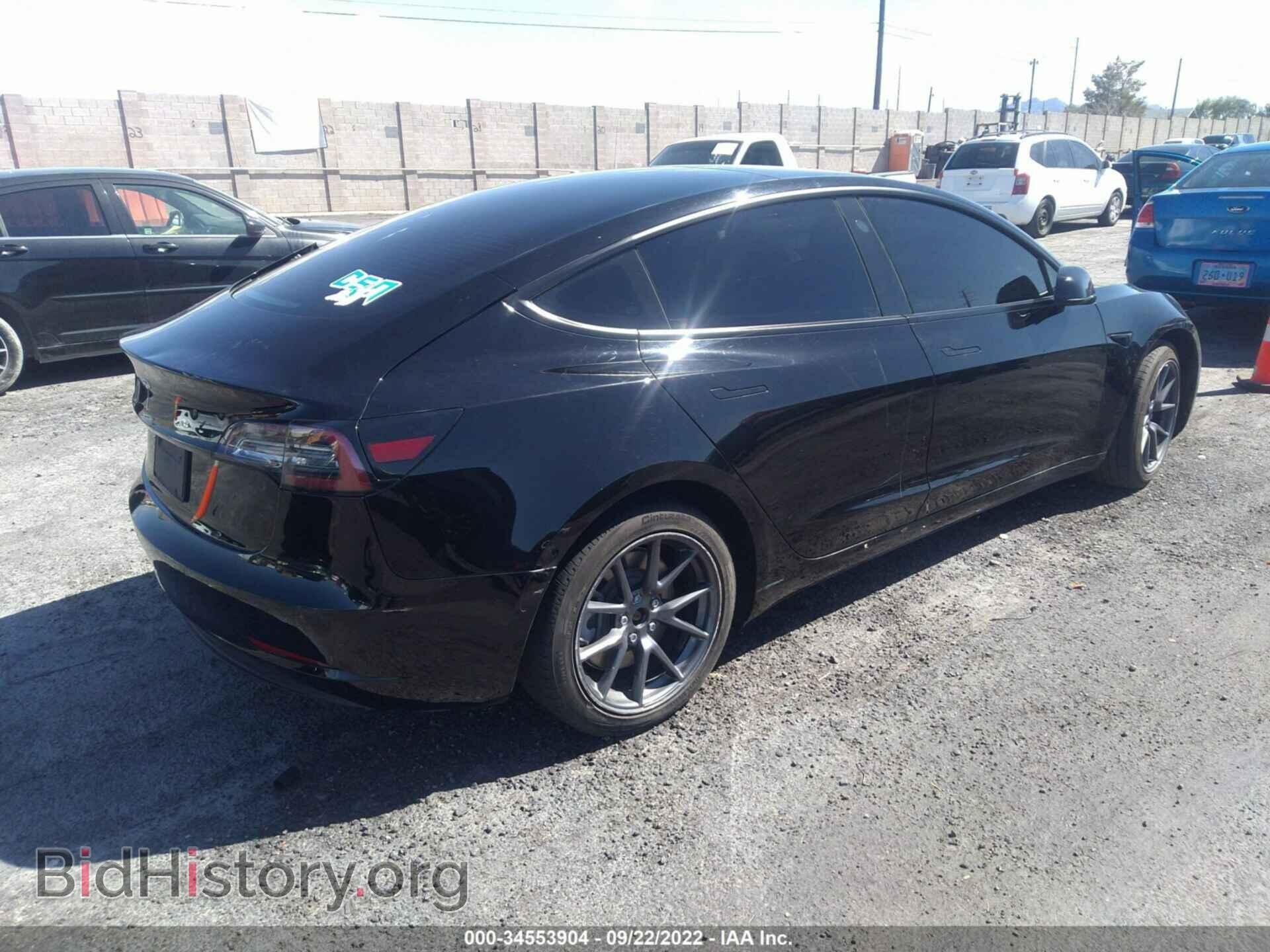 2021 TESLA MODEL 3 - VIN: 5YJ3E1EA7MF871605 - Photo 4