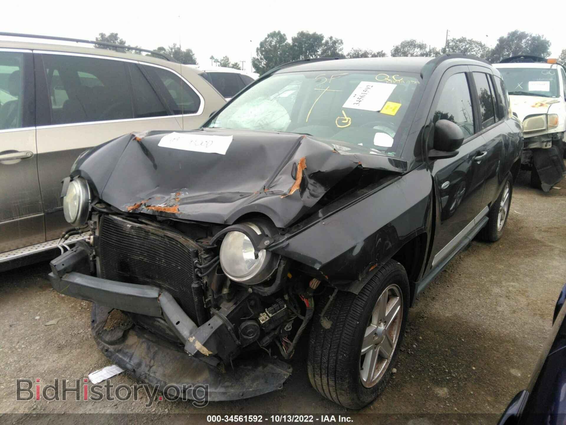 2010 JEEP COMPASS - VIN: 1J4NT1FA6AD647039 - Photo 2