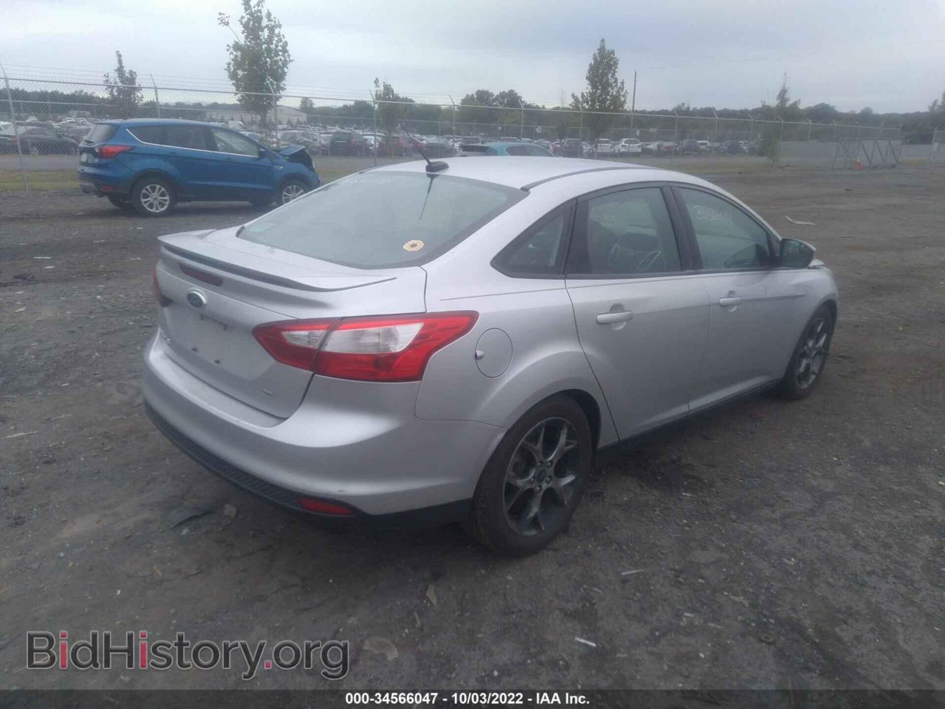 2014 FORD FOCUS - VIN: 1FADP3F28EL212969 - Photo 4