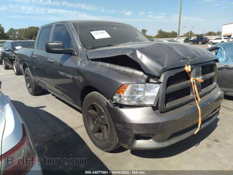 2012 RAM 1500 Express (VIN 1C6RD6KT9CS332489) — photo 1 of 11, IAAI, damage: front end