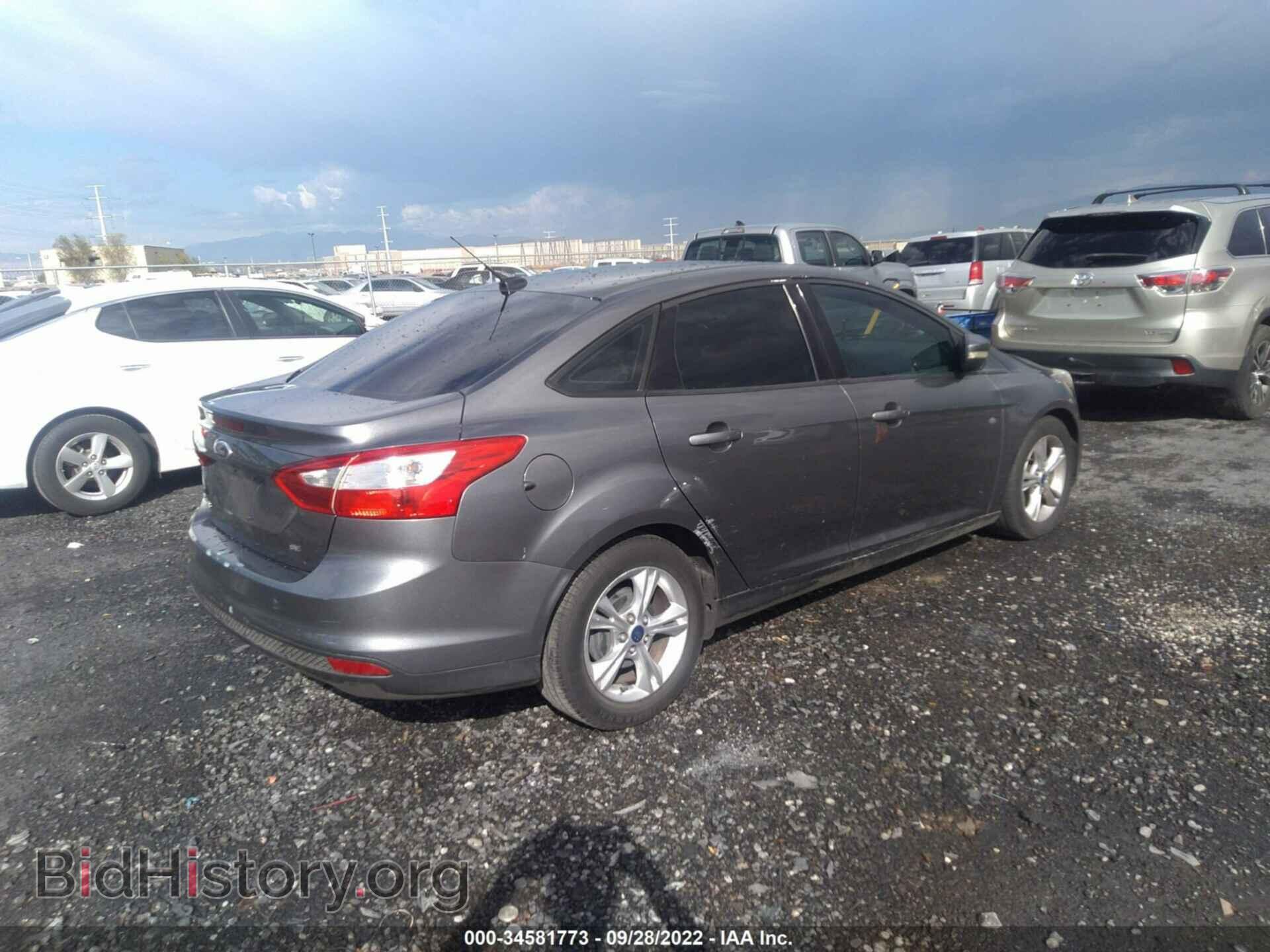 2014 FORD FOCUS - VIN: 1FADP3F2XEL312961 - Photo 4