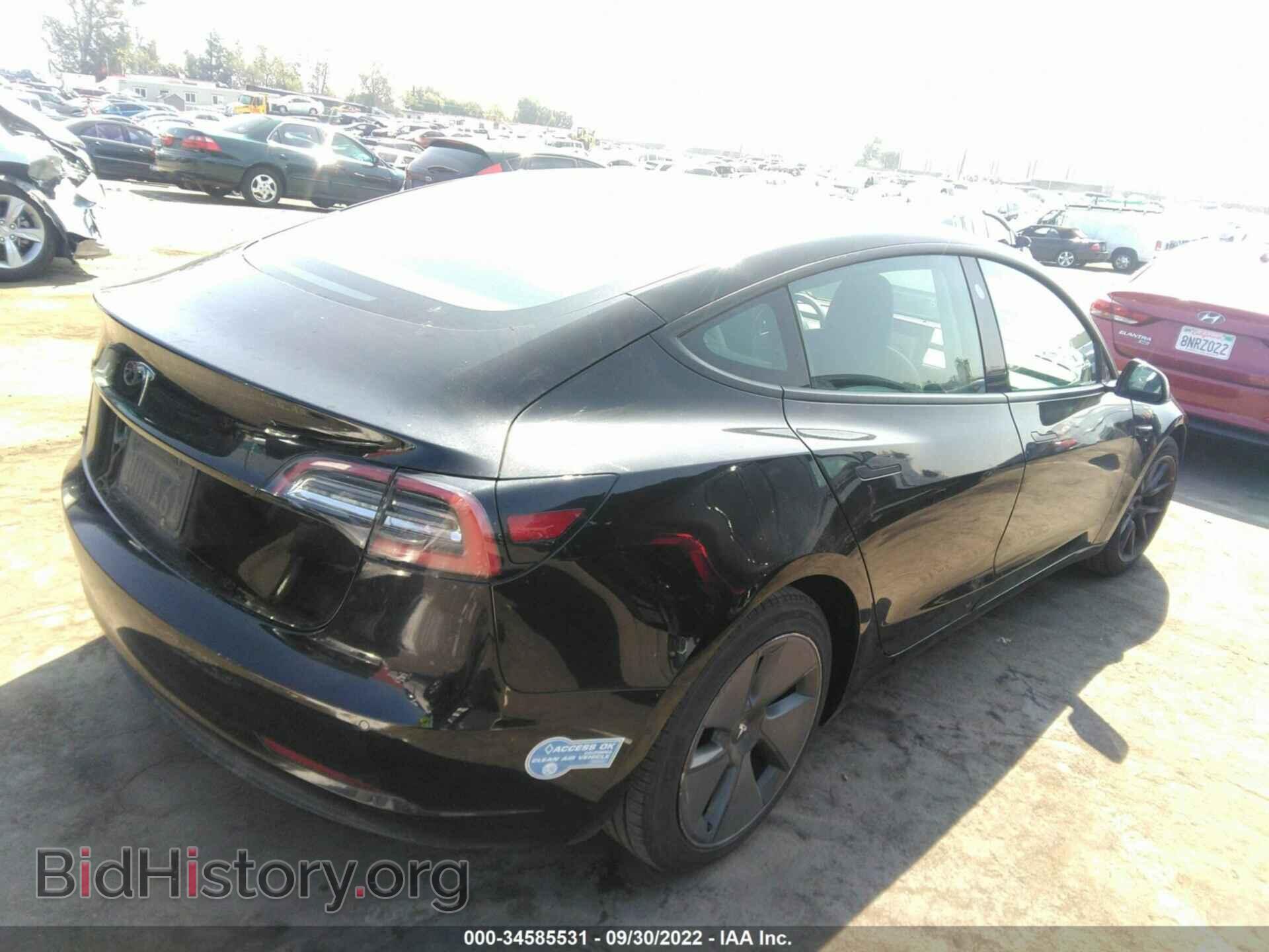 2021 TESLA MODEL 3 - VIN: 5YJ3E1EA1MF875486 - Photo 4