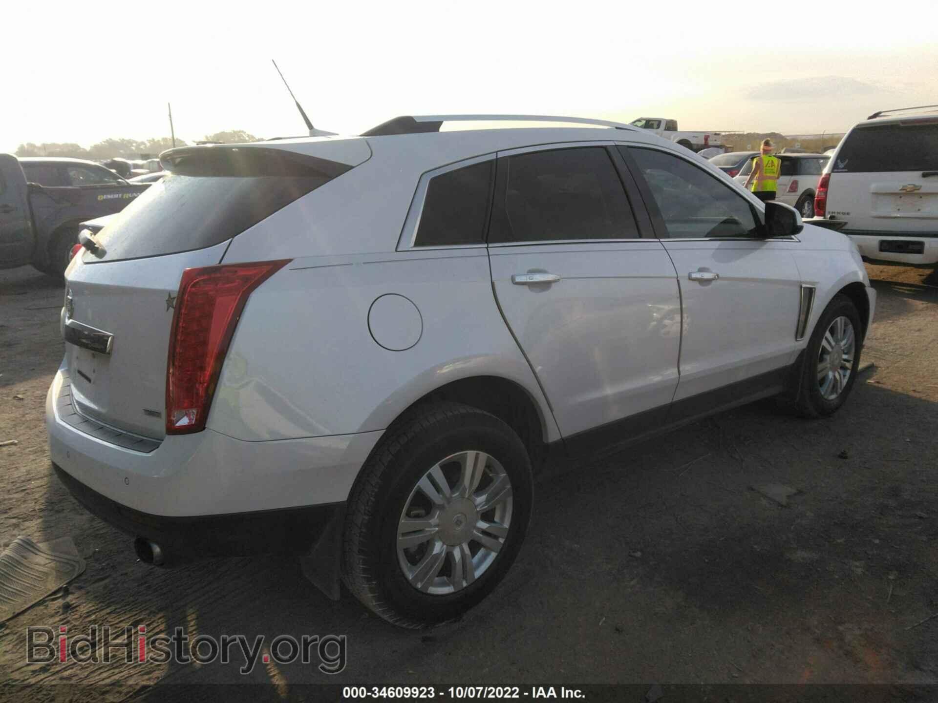 2013 CADILLAC SRX - VIN: 3GYFNCE37DS640036 - Фото 4
