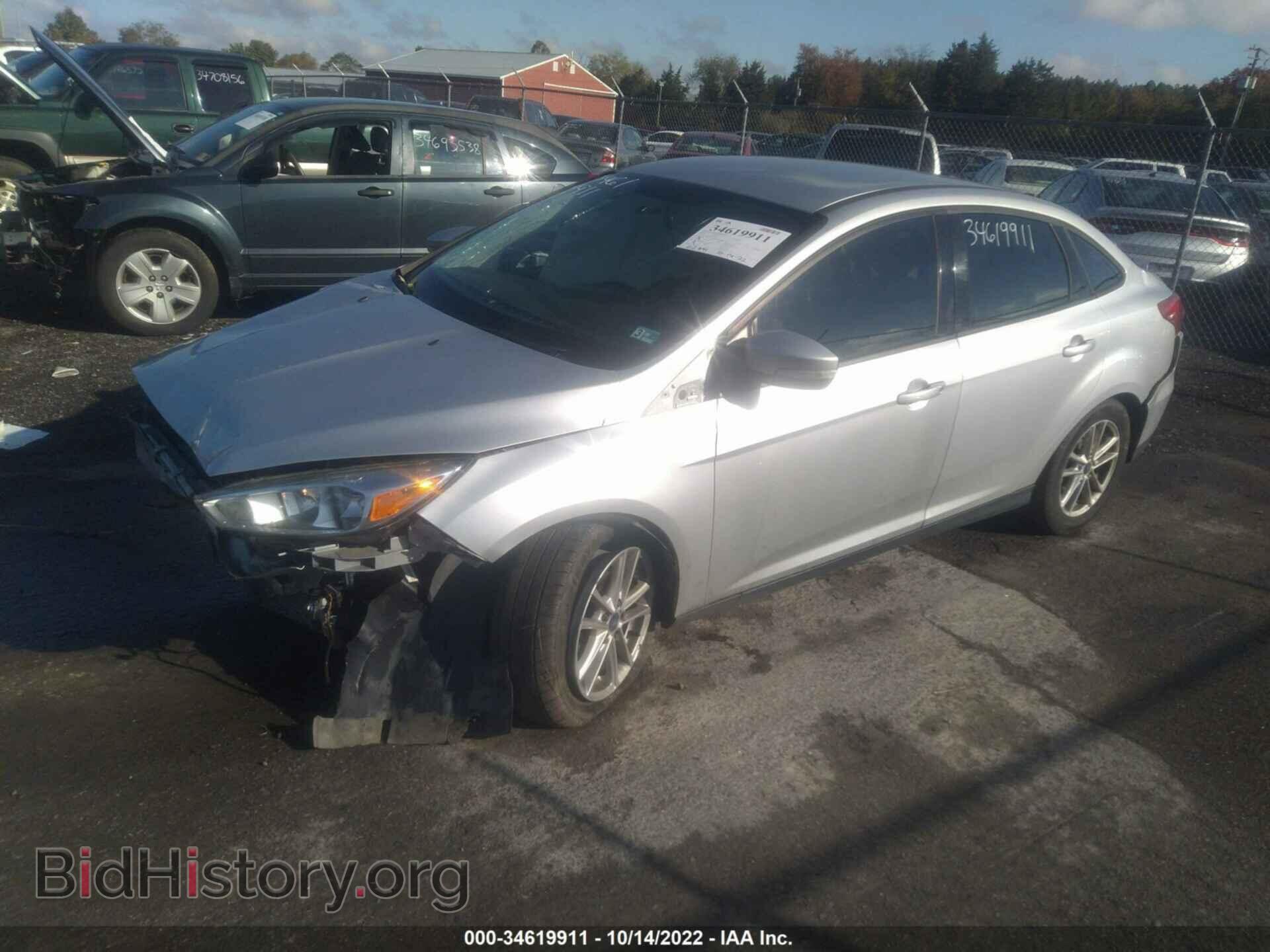 2016 FORD FOCUS - VIN: 1FADP3F21GL323396 - Фото 2