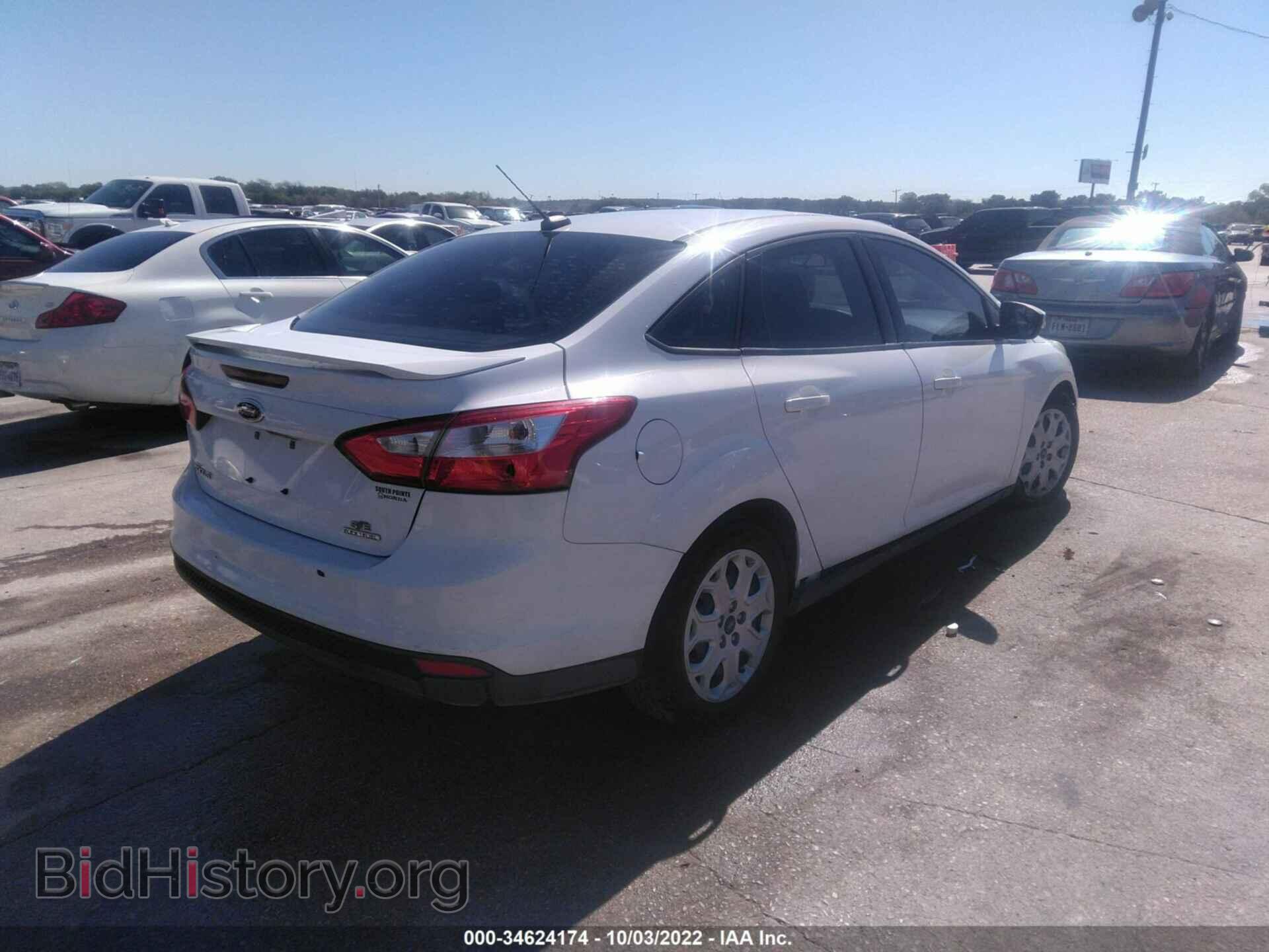 2014 FORD FOCUS - VIN: 1FADP3F22EL264100 - Photo 4