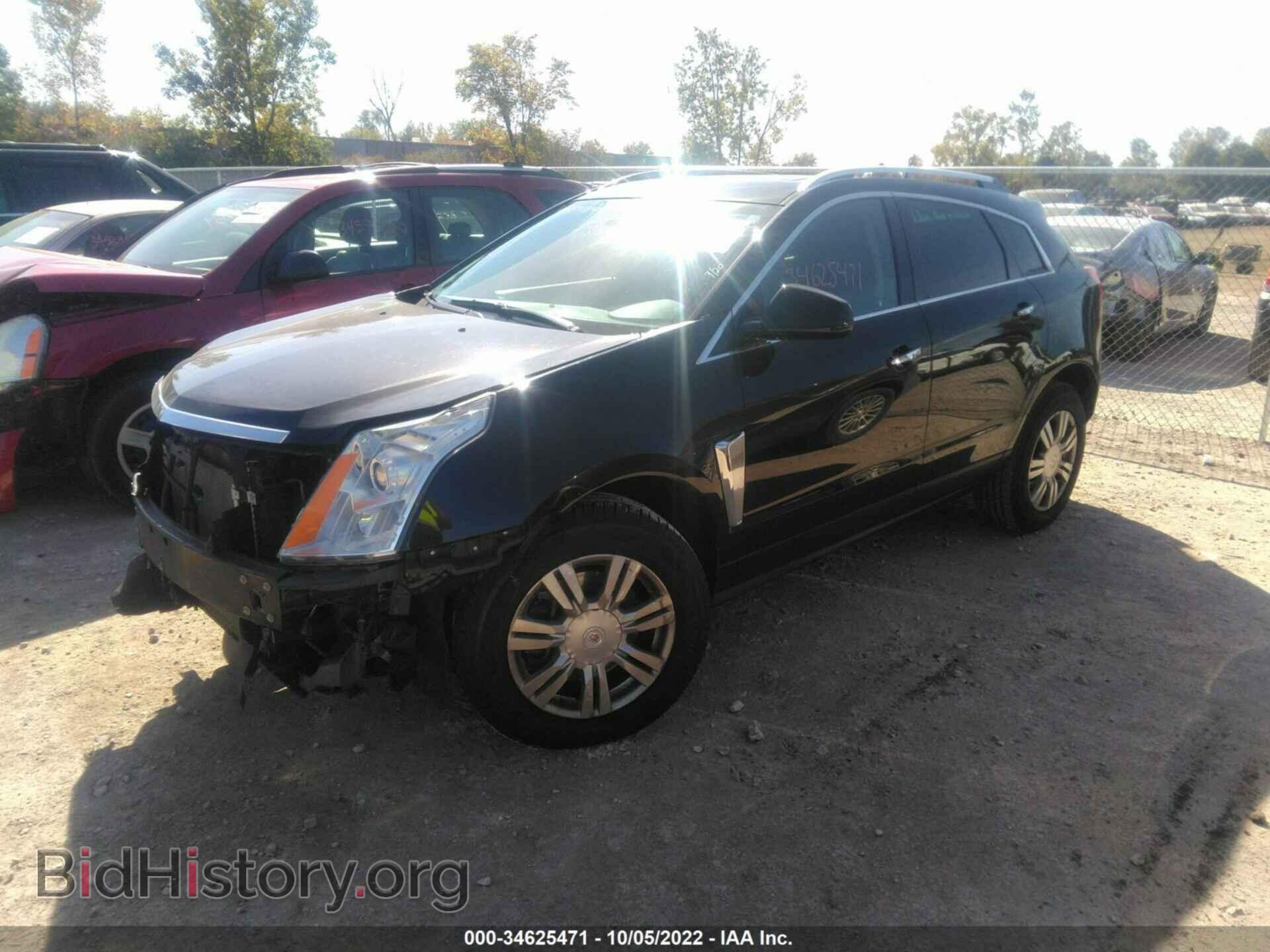 2014 CADILLAC SRX - VIN: 3GYFNEE30ES527770 - Фото 2