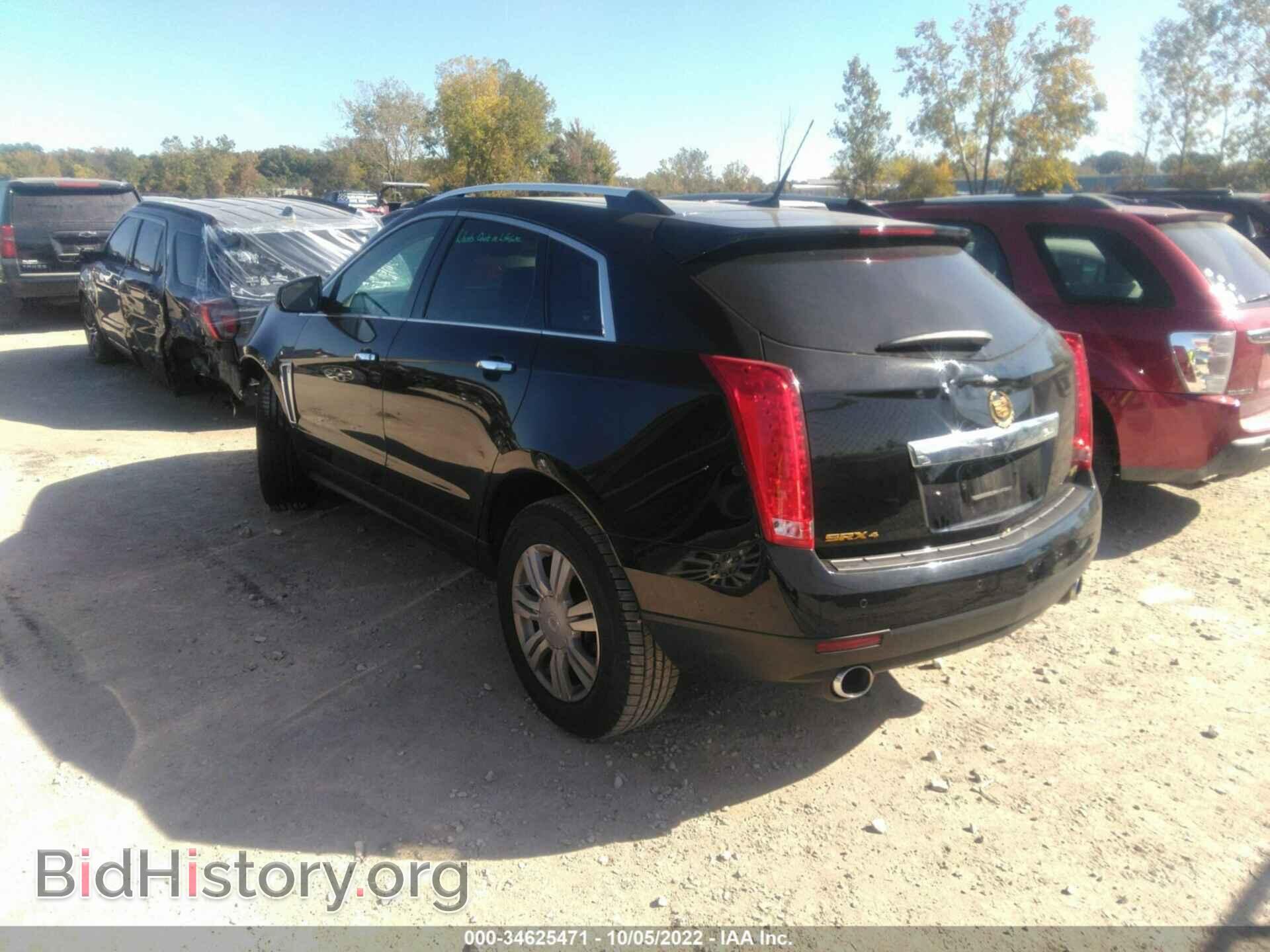 2014 CADILLAC SRX - VIN: 3GYFNEE30ES527770 - Фото 3