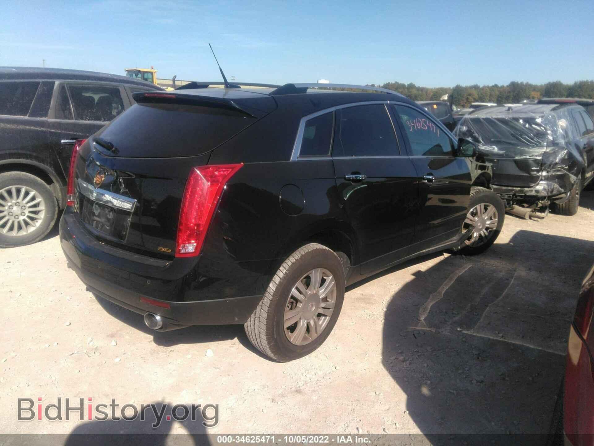 2014 CADILLAC SRX - VIN: 3GYFNEE30ES527770 - Фото 4