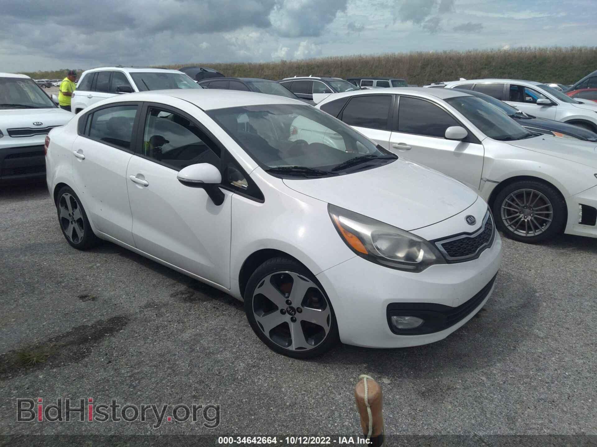Фотография KNADN4A3XC6086998 - KIA RIO 2012
