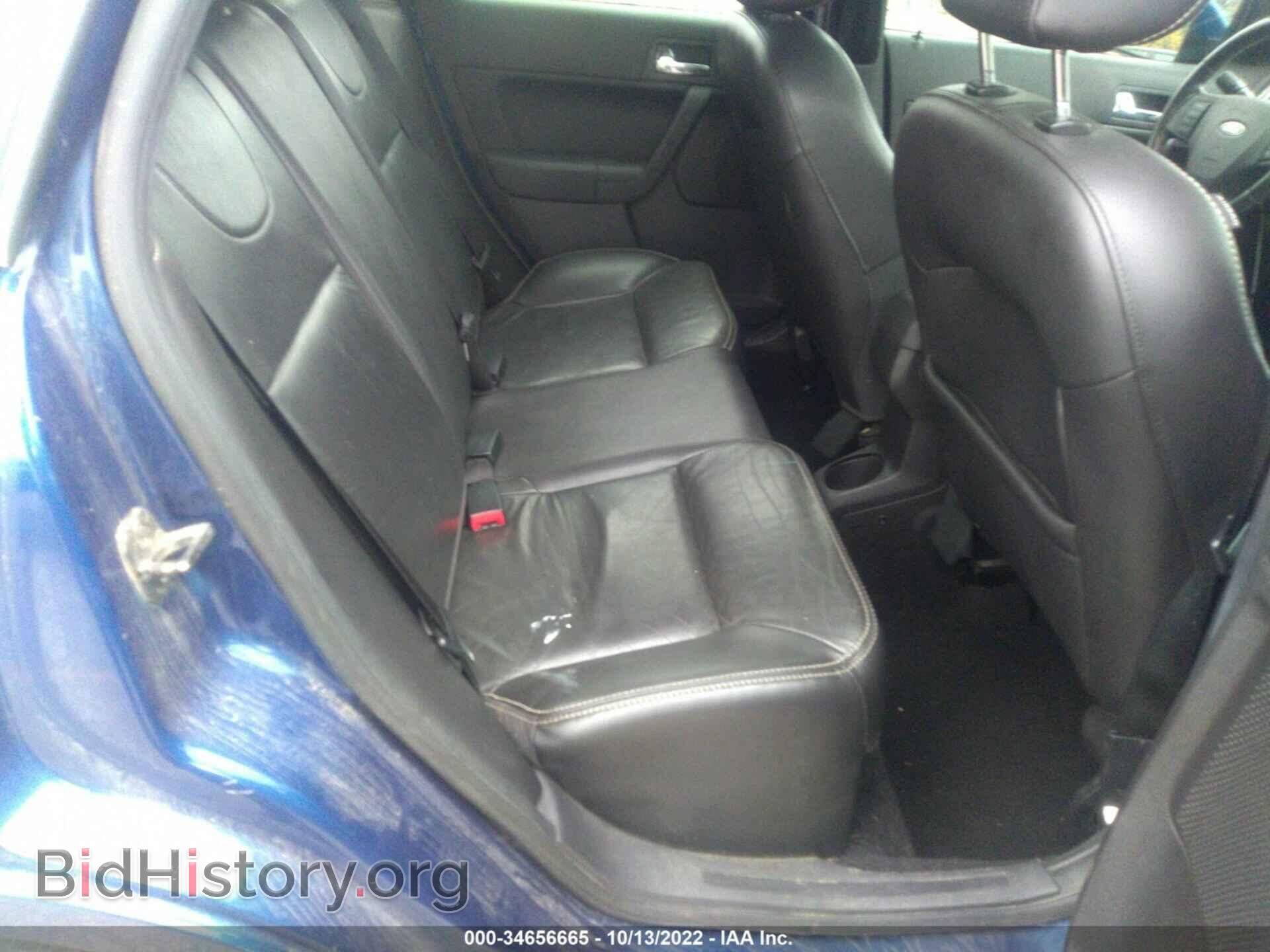 2009 FORD FOCUS - VIN: 1FAHP36N99W170702 - Фото 8