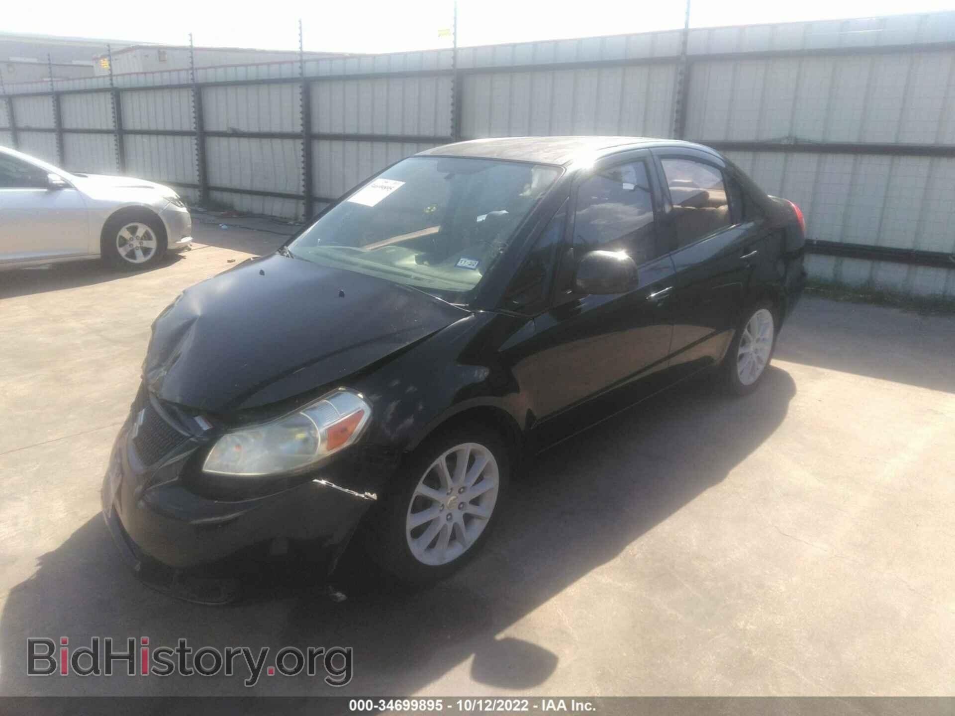 2011 SUZUKI SX4 - VIN: JS2YC5A21B6303821 - Фото 2
