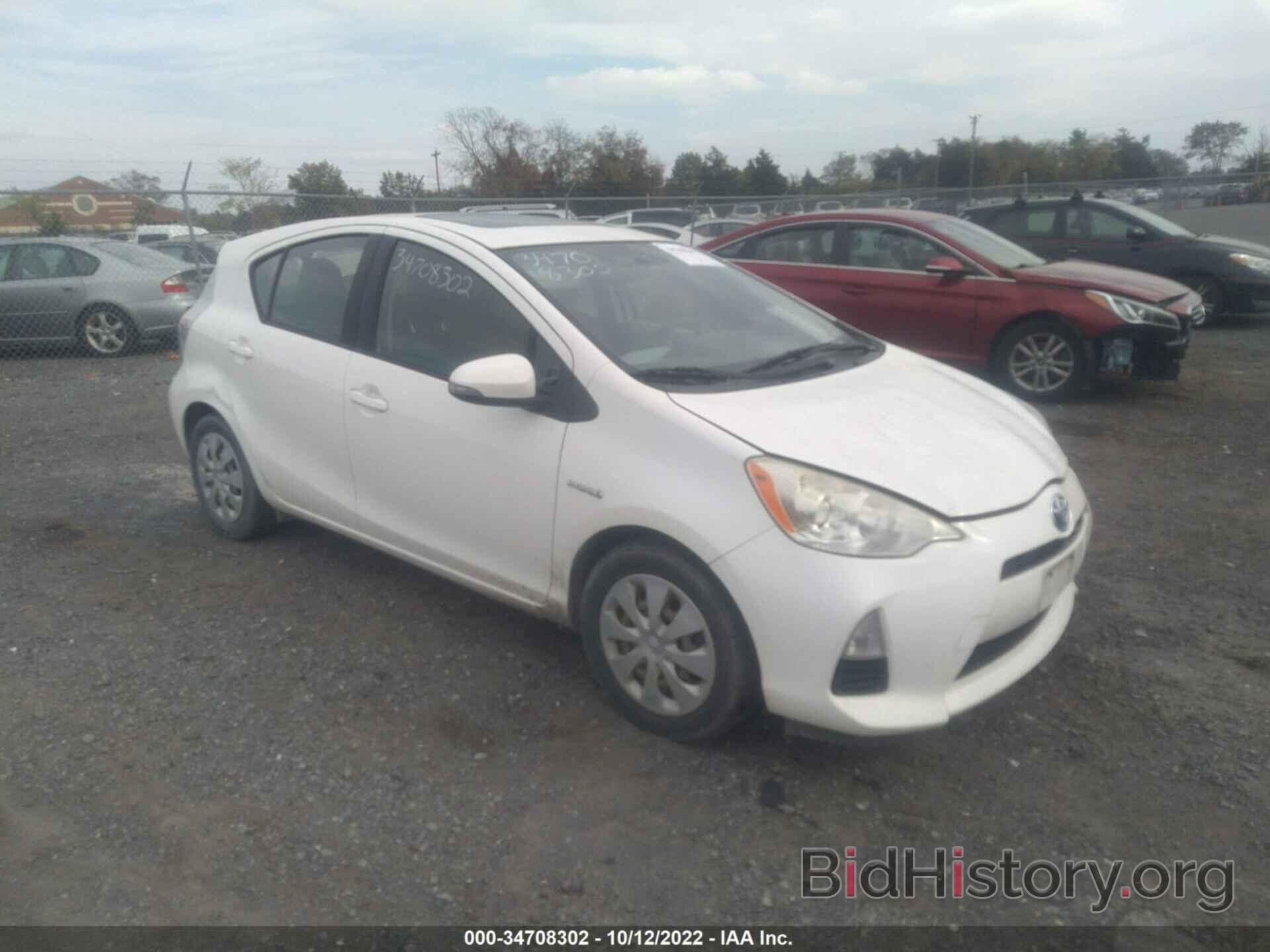 Фотография JTDKDTB31C1001453 - TOYOTA PRIUS C 2012