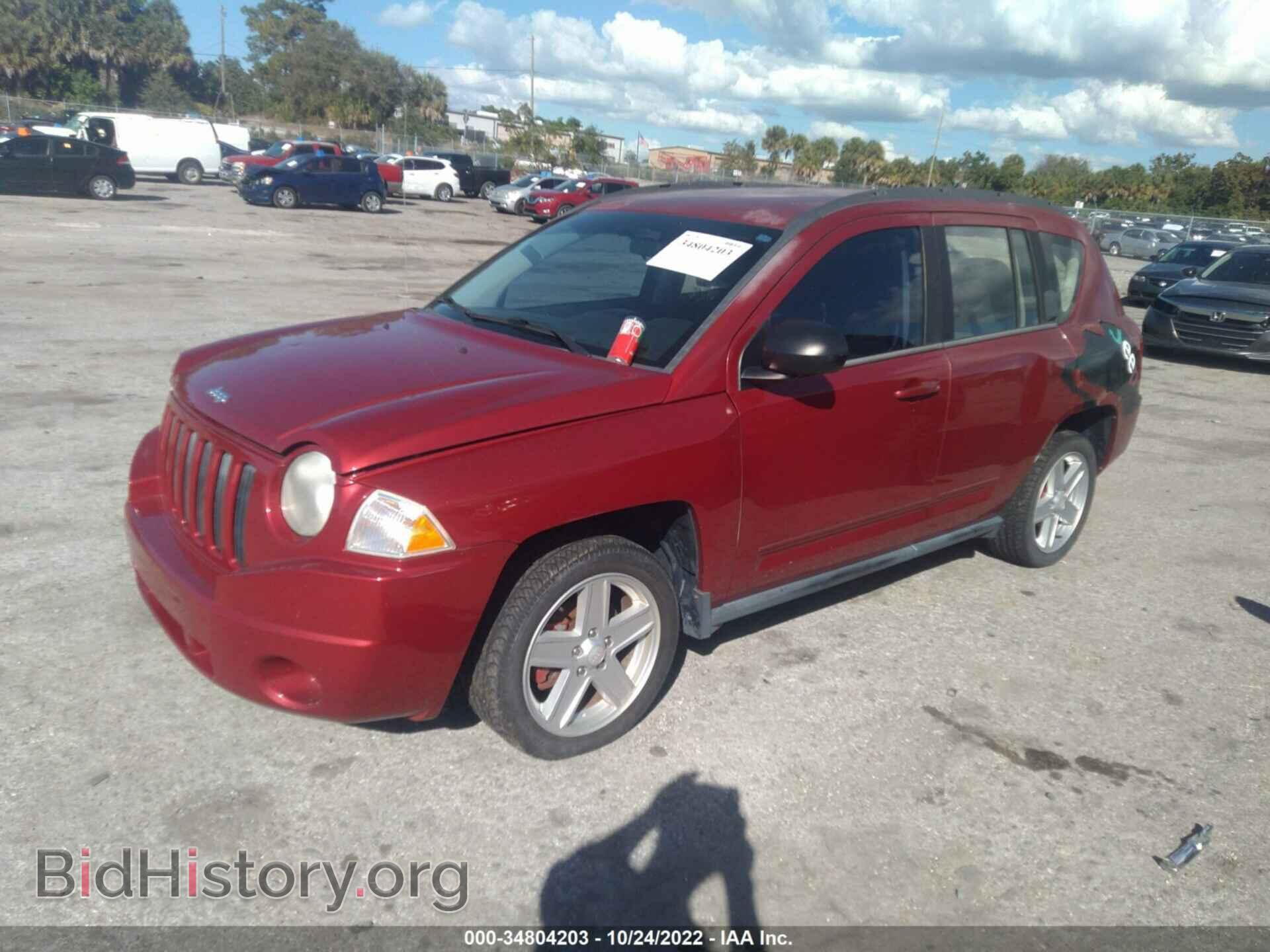 2010 JEEP COMPASS - VIN: 1J4NT4FB9AD558205 - Фото 2