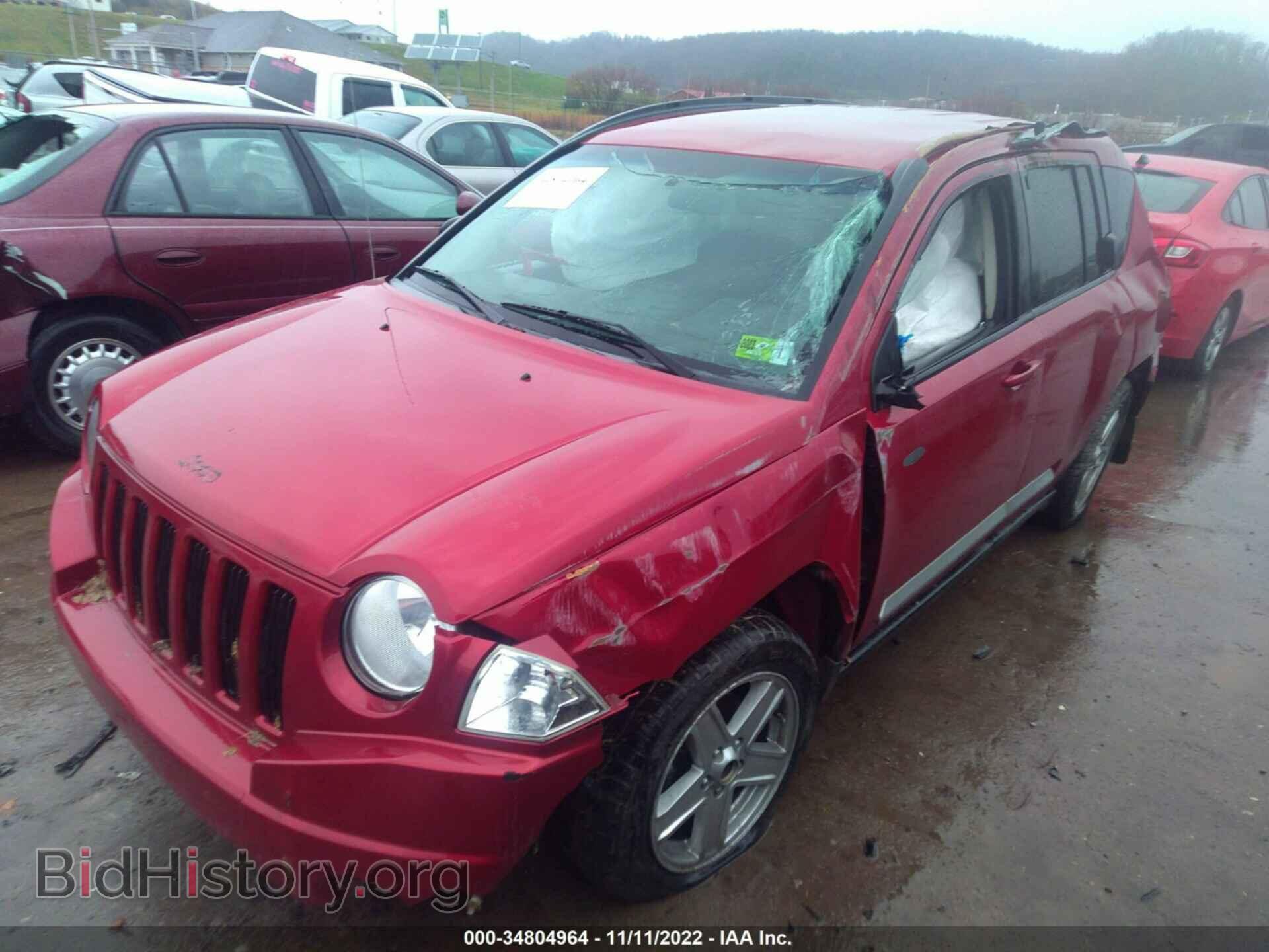 2010 JEEP COMPASS - VIN: 1J4NF1FB1AD652438 - Photo 2