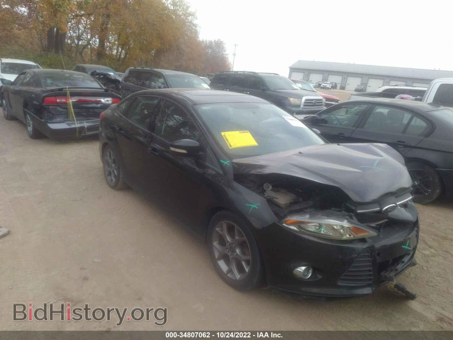 Фотография 1FADP3F25EL299021 - FORD FOCUS 2014
