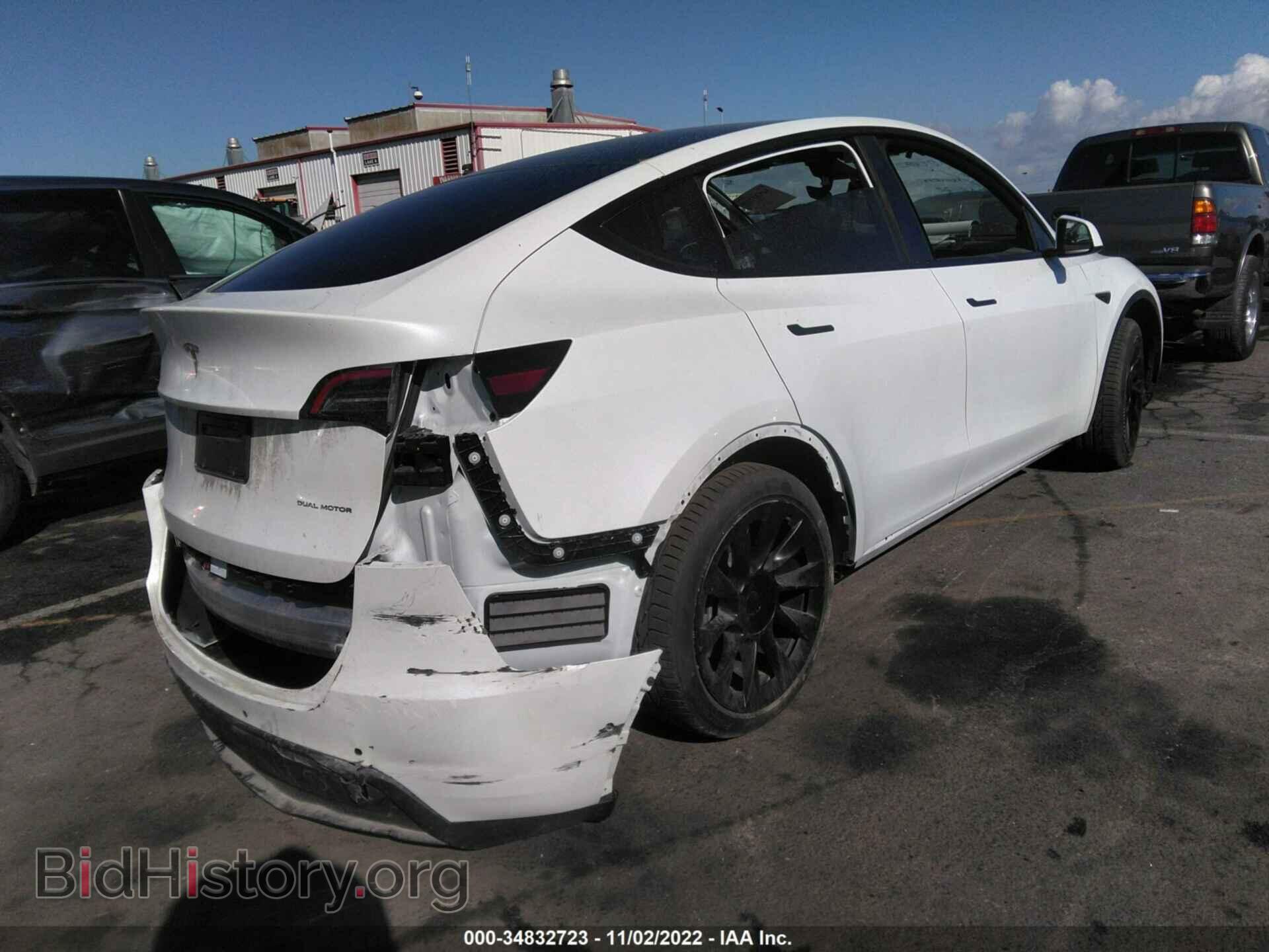 2022 TESLA MODEL Y - VIN: 7SAYGDEE6NF411909 - Photo 4