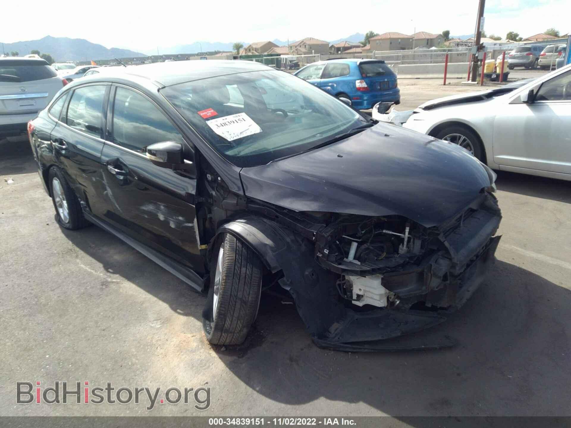 Фотография 1FADP3F25DL337796 - FORD FOCUS 2013