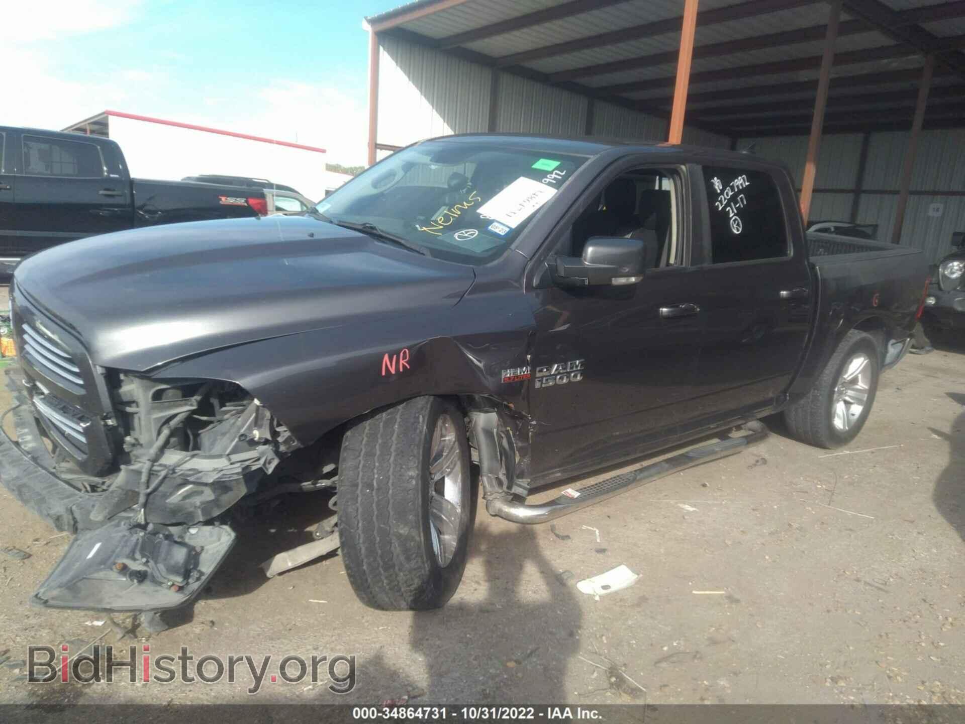 2014 RAM 1500 - VIN: 1C6RR6MT9ES204190 - Фото 2