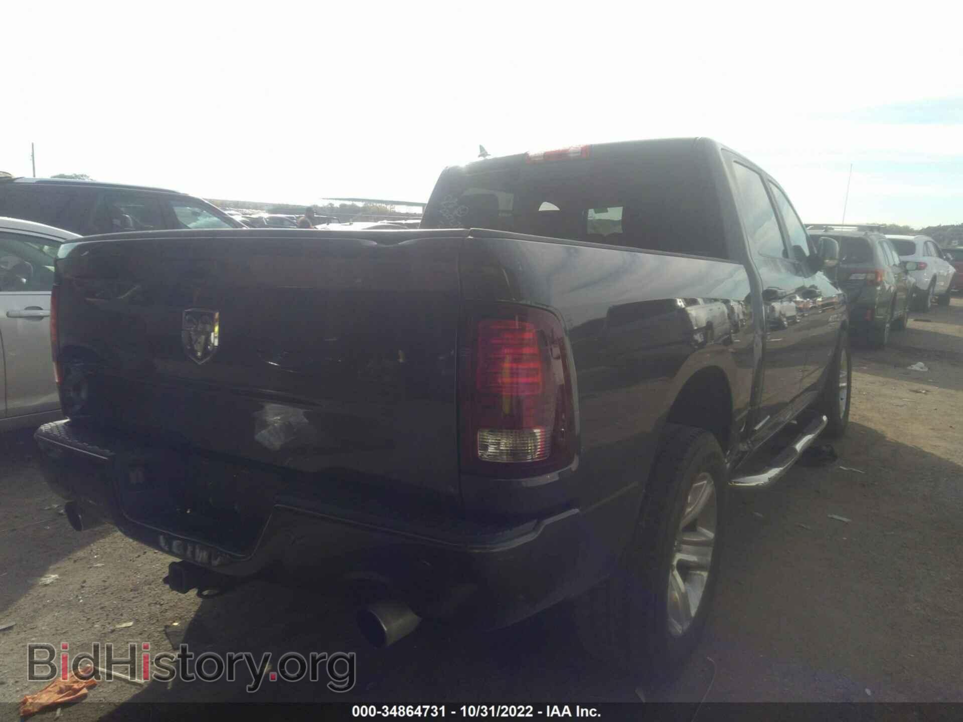 2014 RAM 1500 - VIN: 1C6RR6MT9ES204190 - Фото 4
