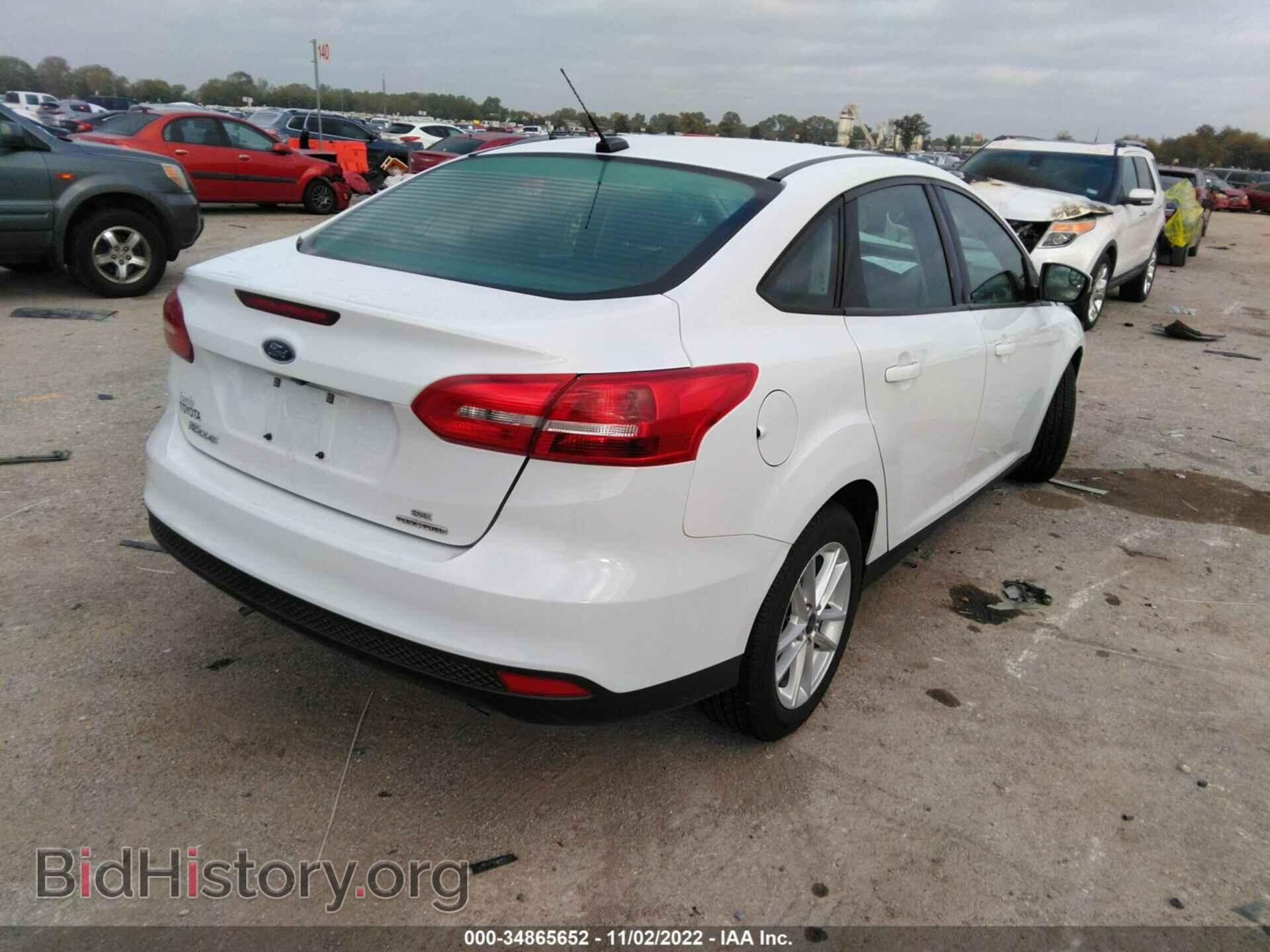 2016 FORD FOCUS - VIN: 1FADP3F22GL373899 - Photo 4