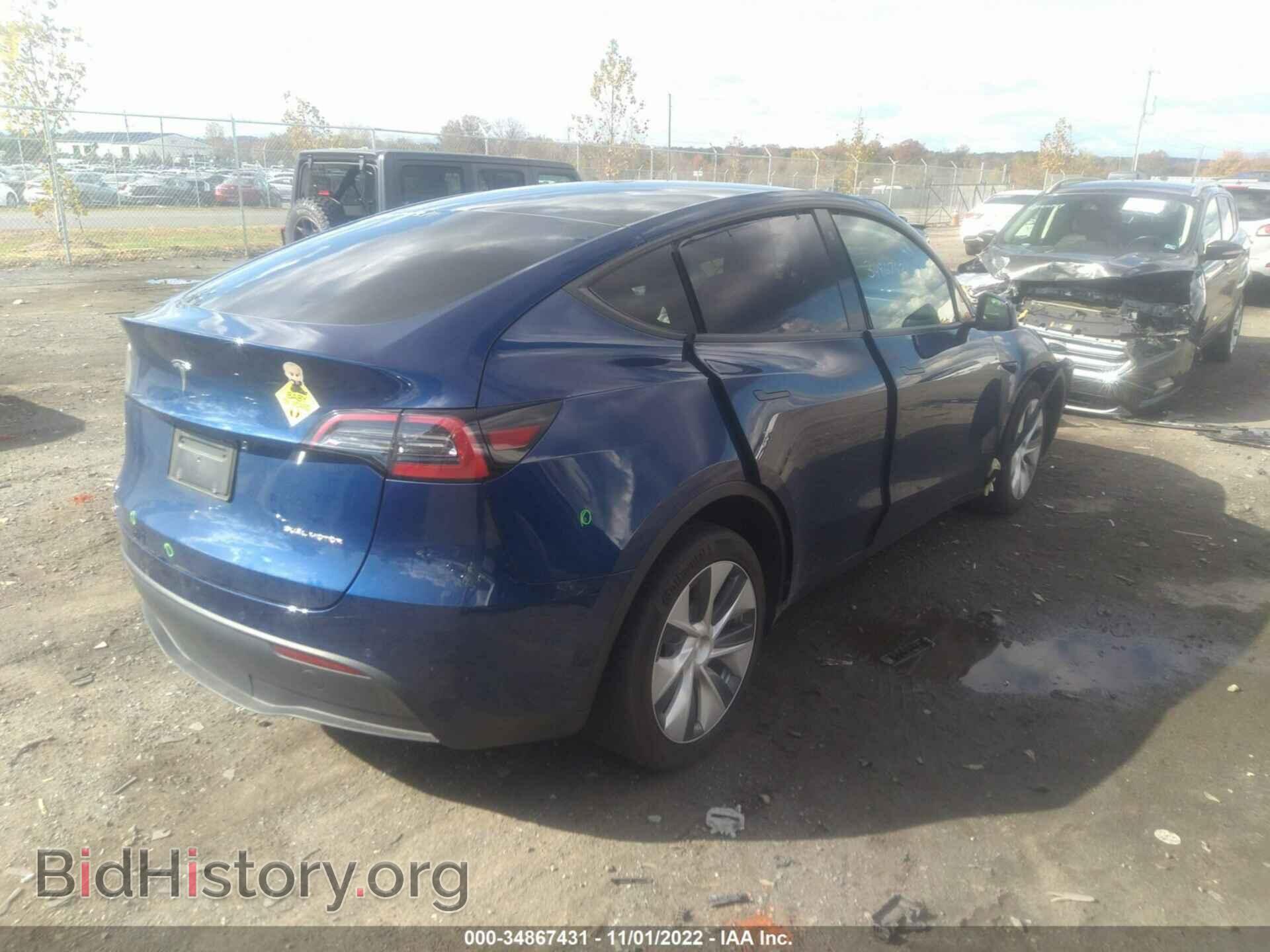2021 TESLA MODEL Y - VIN: 5YJYGAEE5MF257946 - Photo 4
