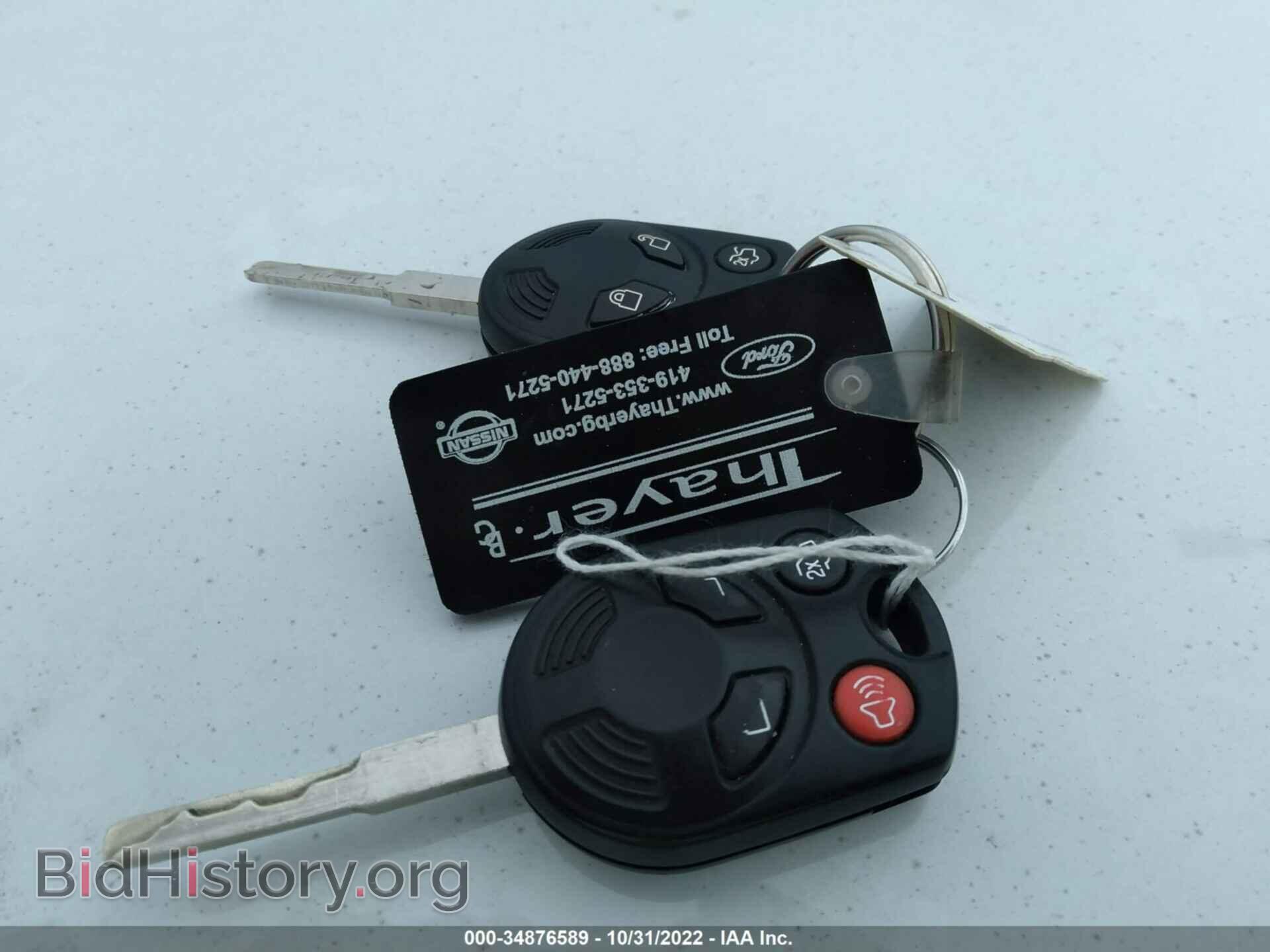 2014 FORD FOCUS - VIN: 1FADP3F24EL183101 - Фото 11