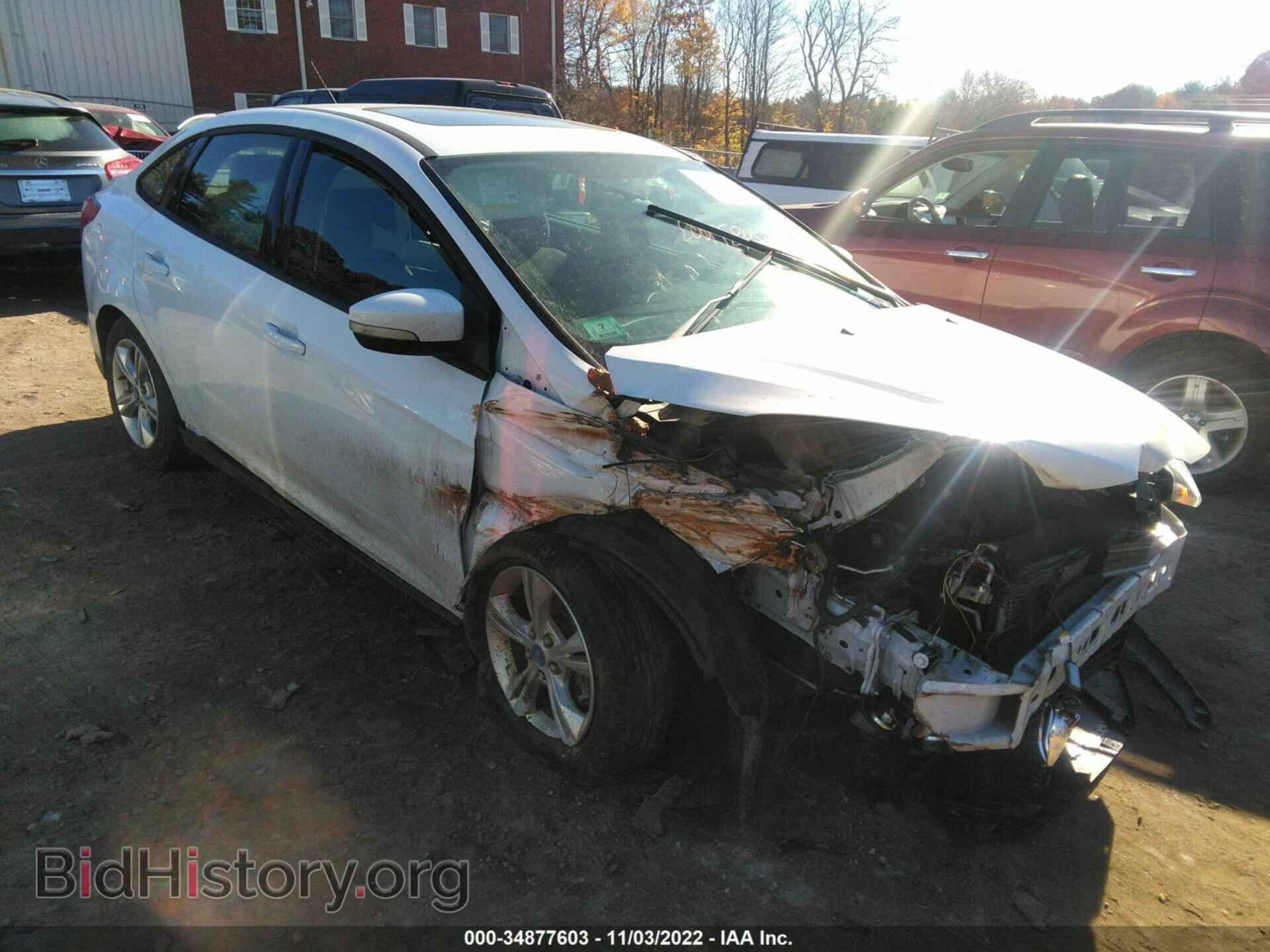 Фотография 1FADP3F20DL201463 - FORD FOCUS 2013