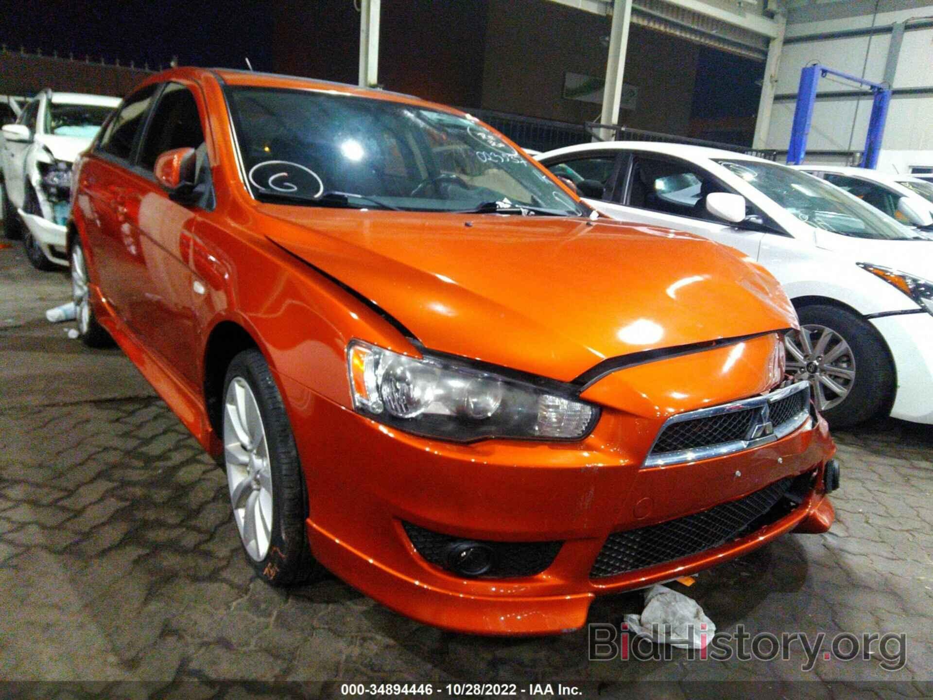 Photo 0032X8HW5BU023537 - MITSUBISHI LANCER 2011