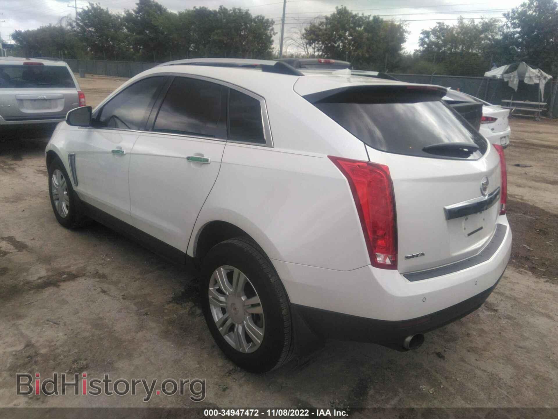 2014 CADILLAC SRX - VIN: 3GYFNBE38ES664440 - Фото 3