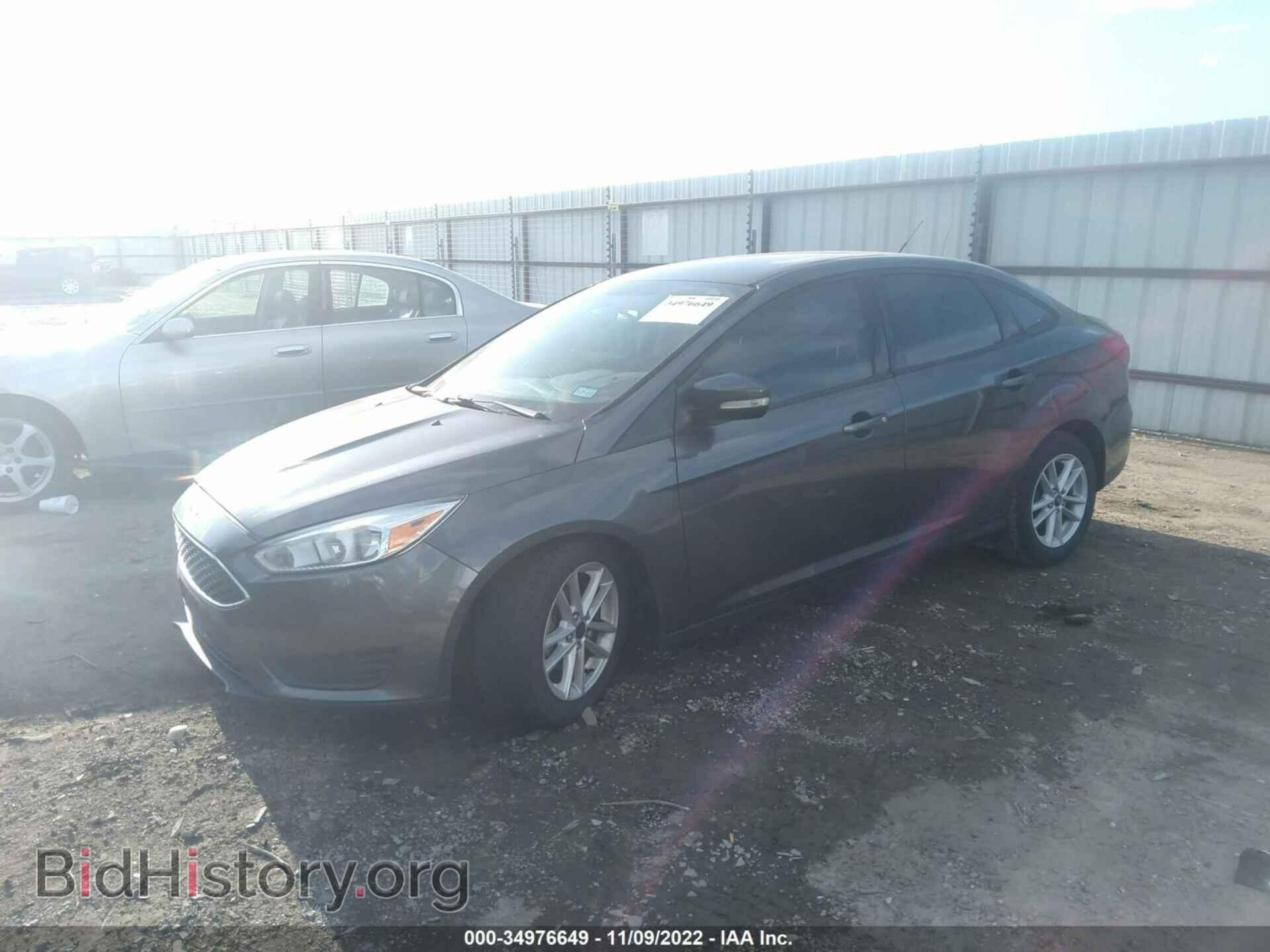 2016 FORD FOCUS - VIN: 1FADP3F26GL360489 - Фото 2