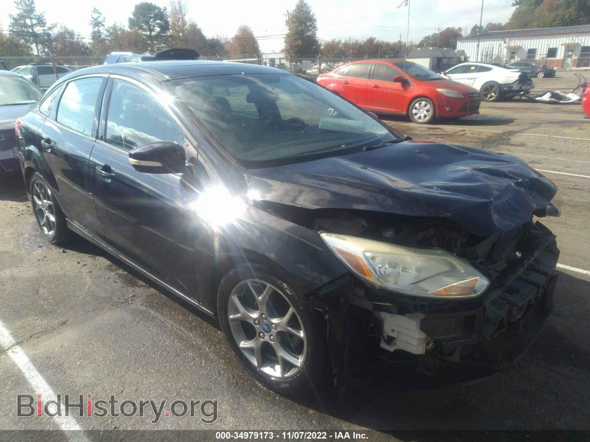 Фотография 1FADP3F26EL204000 - FORD FOCUS 2014