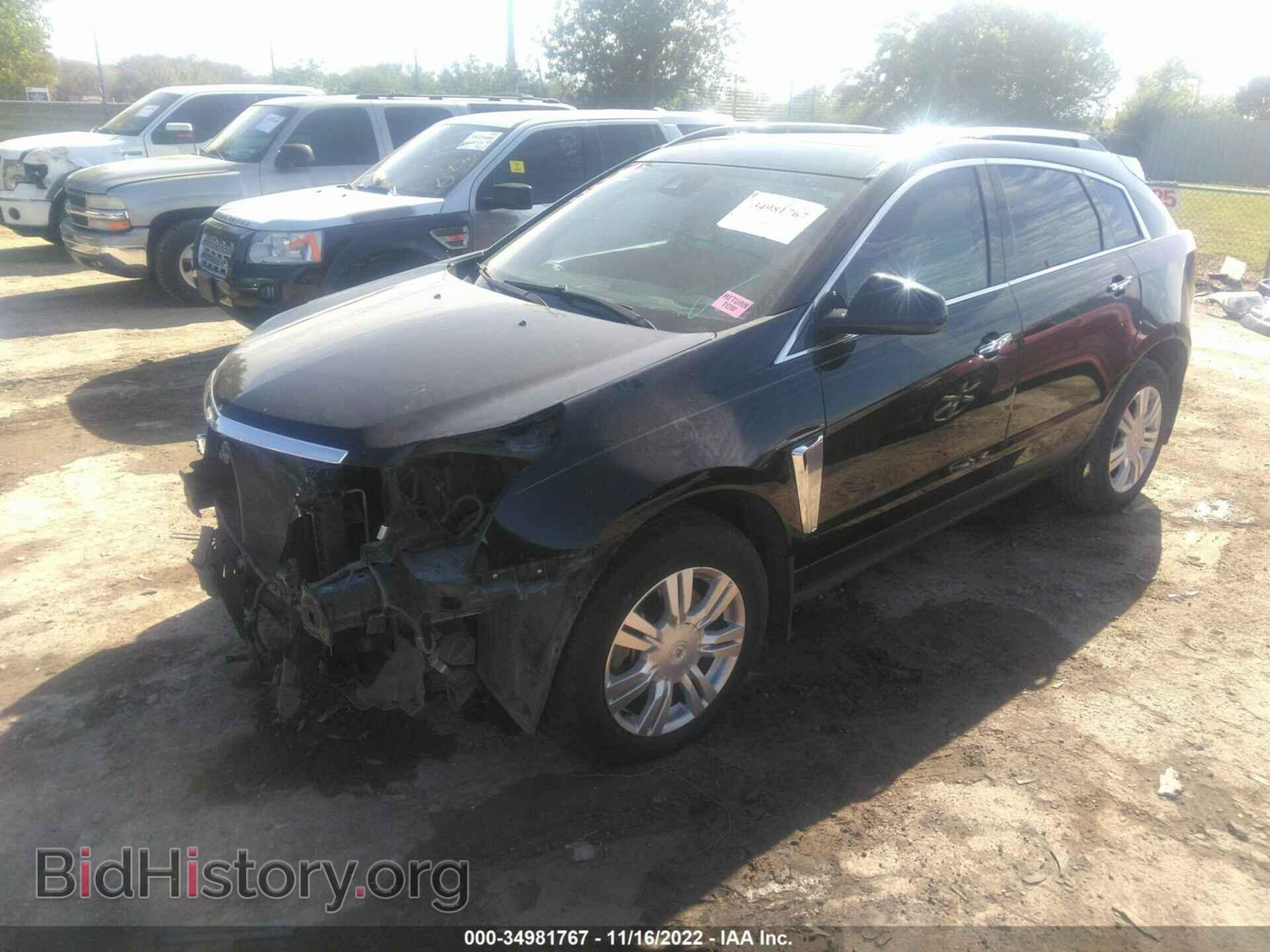 2014 CADILLAC SRX - VIN: 3GYFNBE34ES562309 - Фото 2
