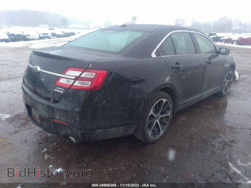 2014 Ford TAURUS (VIN 1FAHP2E89EG152436) — photo 4 of 11