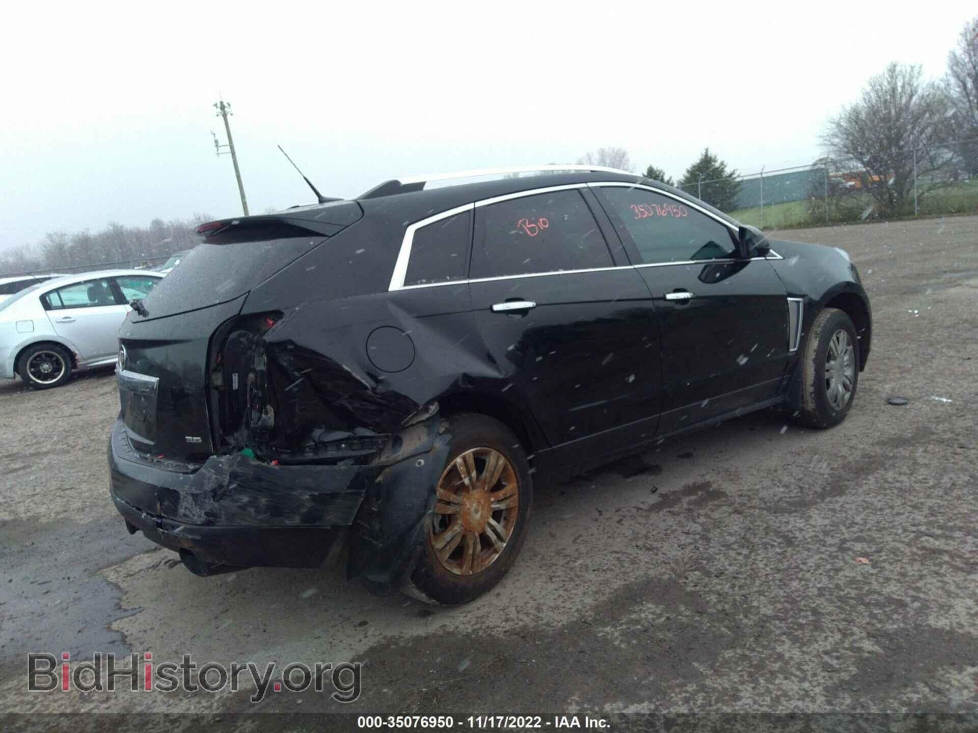 2014 CADILLAC SRX - VIN: 3GYFNEE33ES627975 - Фото 4