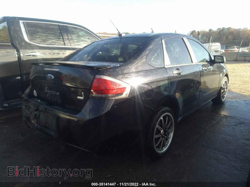 2011 Ford FOCUS (VIN 1FAHP3GN9BW200074) — фото 4 из 11