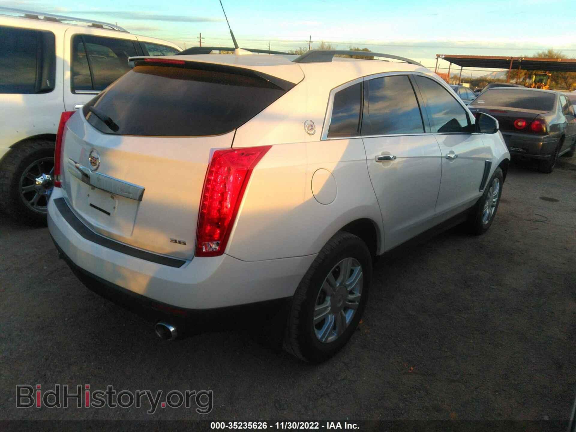 2014 CADILLAC SRX - VIN: 3GYFNAE37ES688321 - Photo 4
