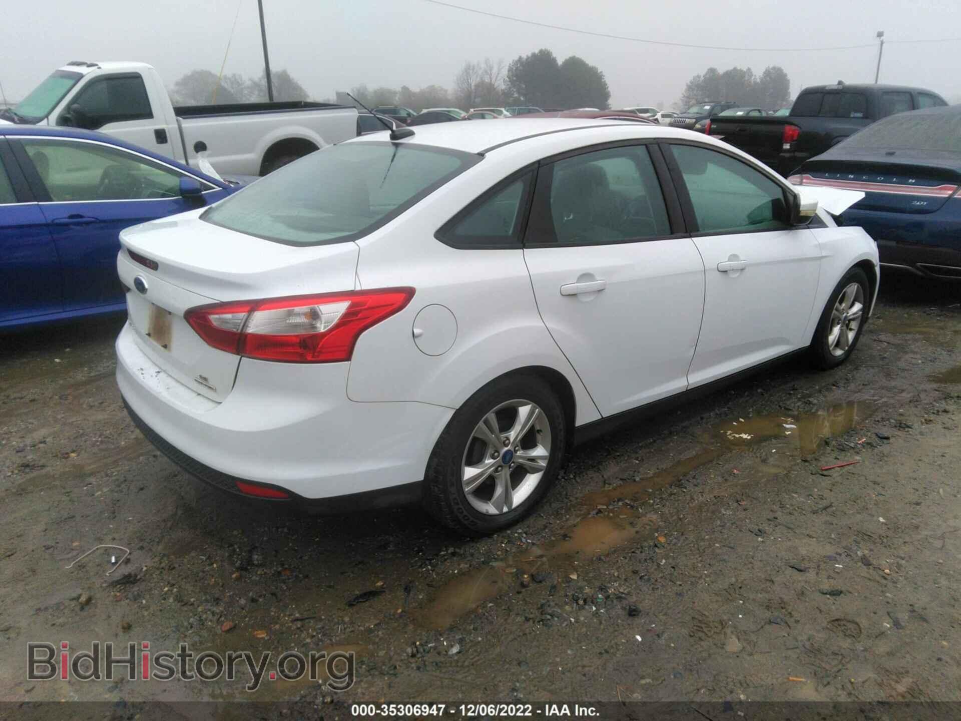 2014 FORD FOCUS - VIN: 1FADP3F20EL158017 - Photo 4