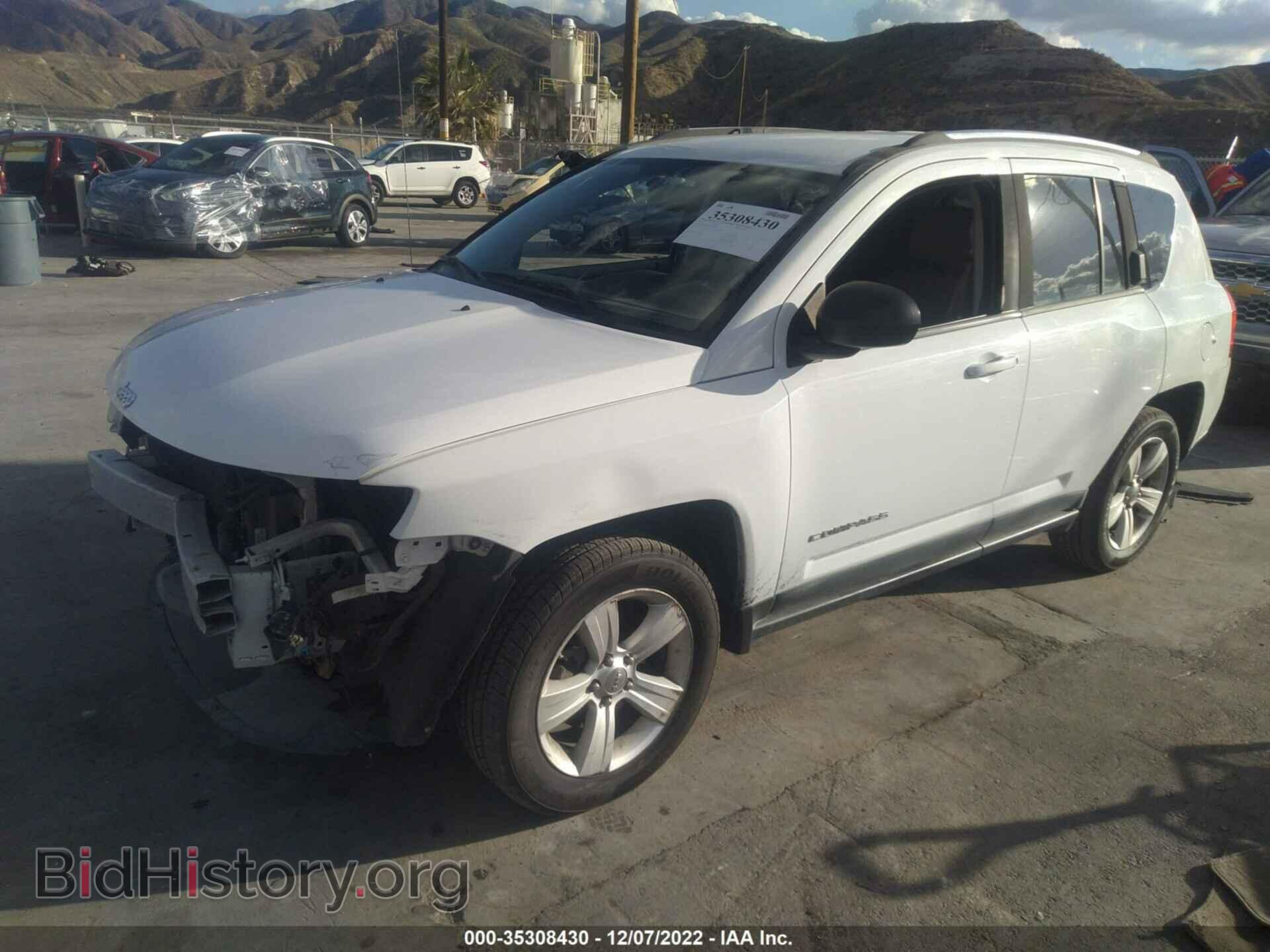 2011 JEEP COMPASS - VIN: 1J4NT1FA9BD203915 - Photo 2