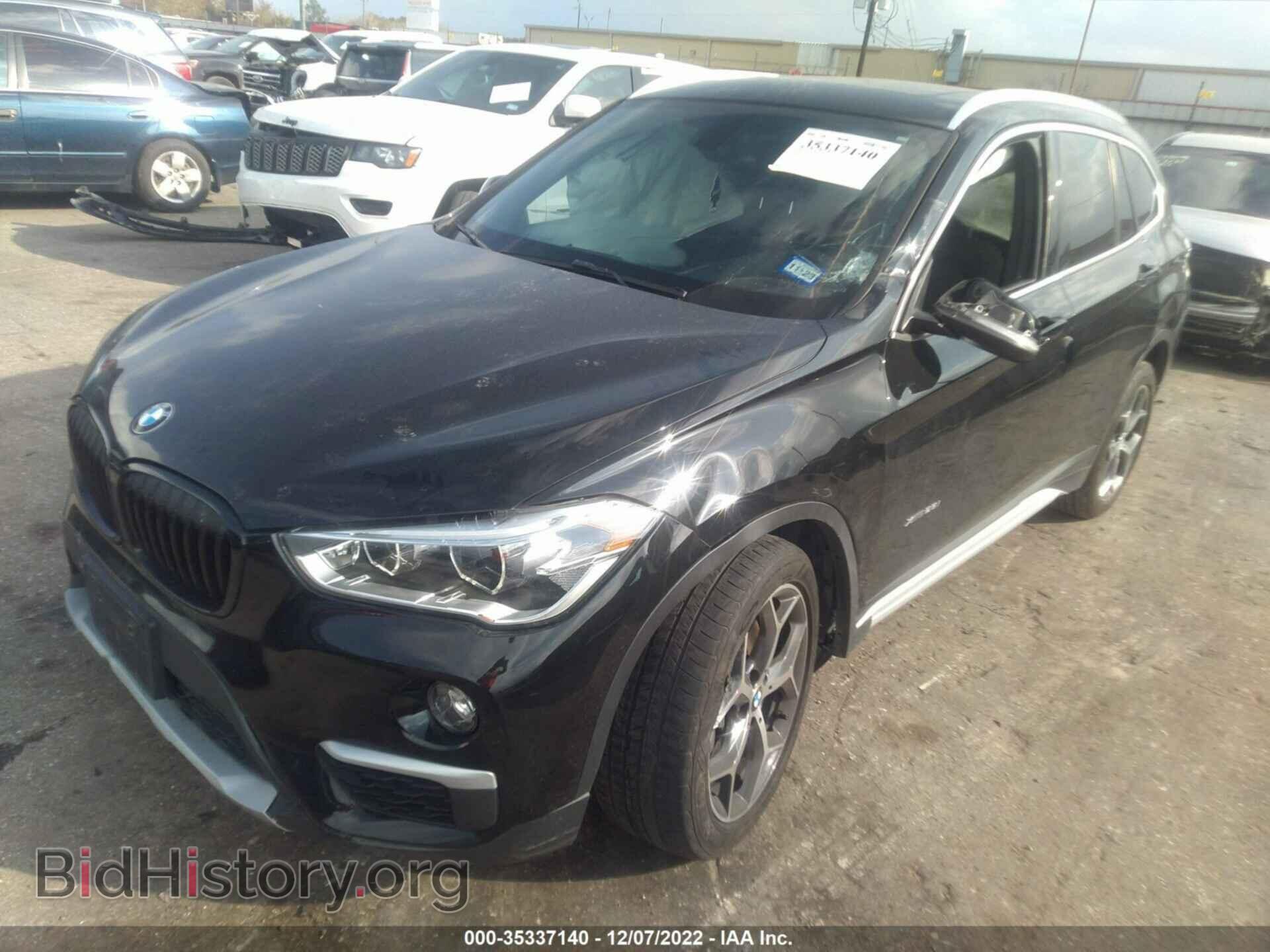 2017 BMW X1 - VIN: WBXHT3Z31H4A57763 - Фото 2