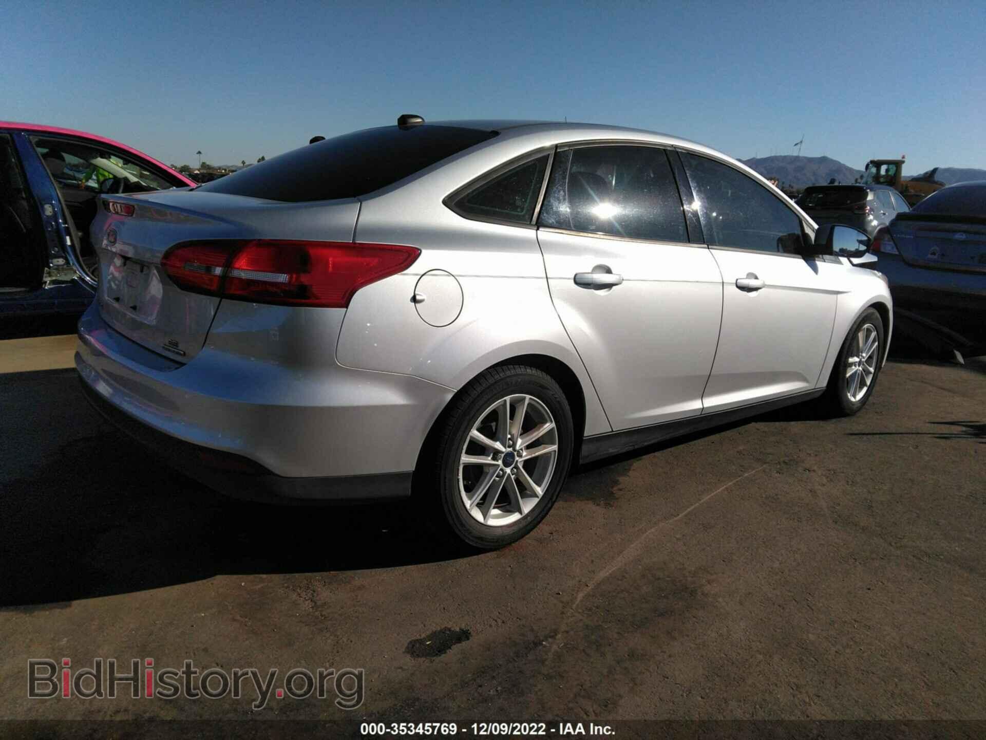 2015 FORD FOCUS - VIN: 1FADP3F21FL256555 - Photo 4