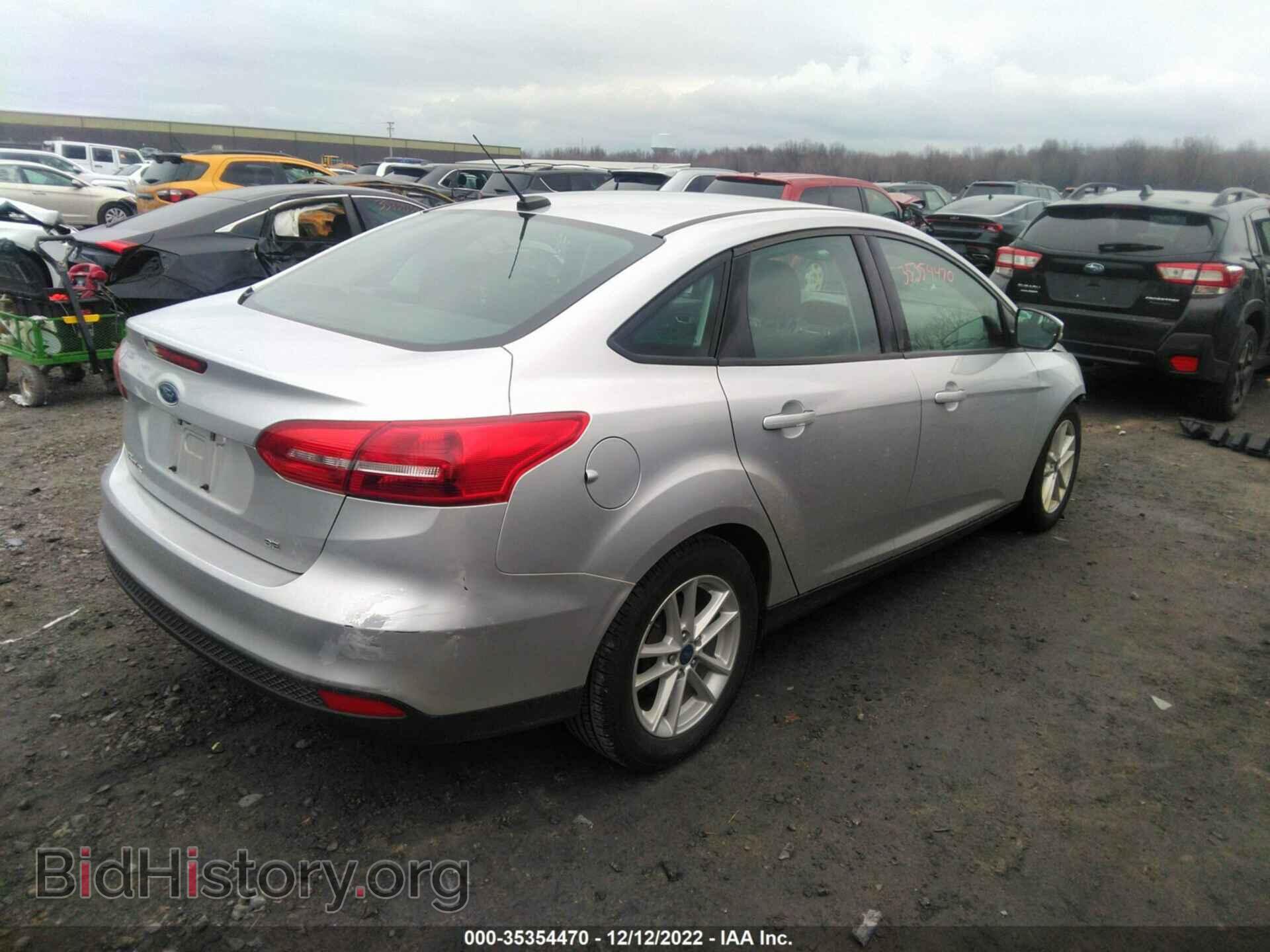 2017 FORD FOCUS - VIN: 1FADP3F24HL323619 - Photo 4