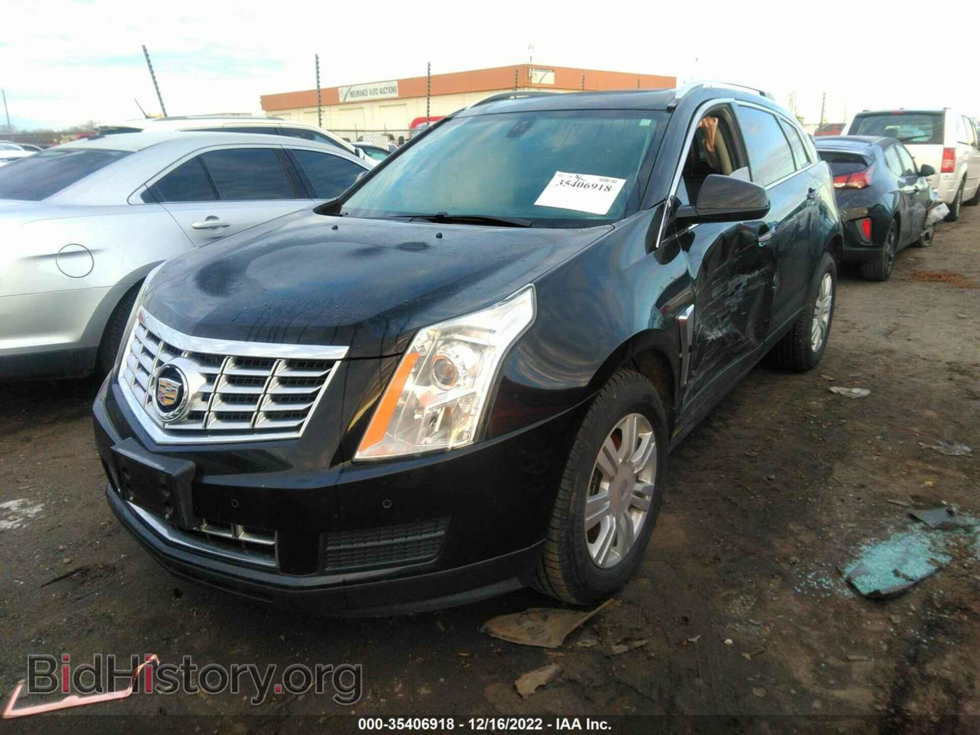 2013 CADILLAC SRX - VIN: 3GYFNCE32DS611561 - Фото 2