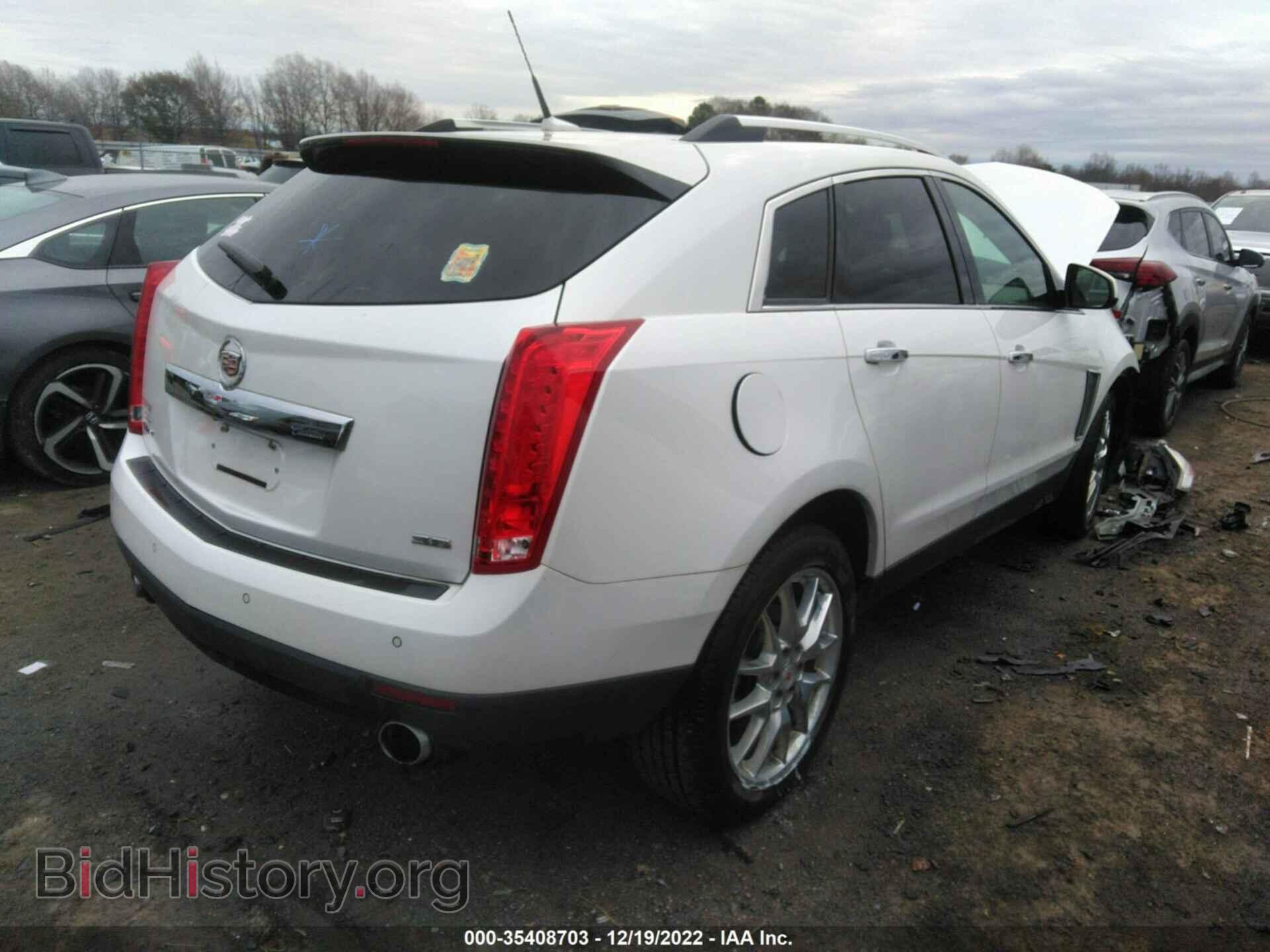 2014 CADILLAC SRX - VIN: 3GYFNDE32ES591142 - Фото 4