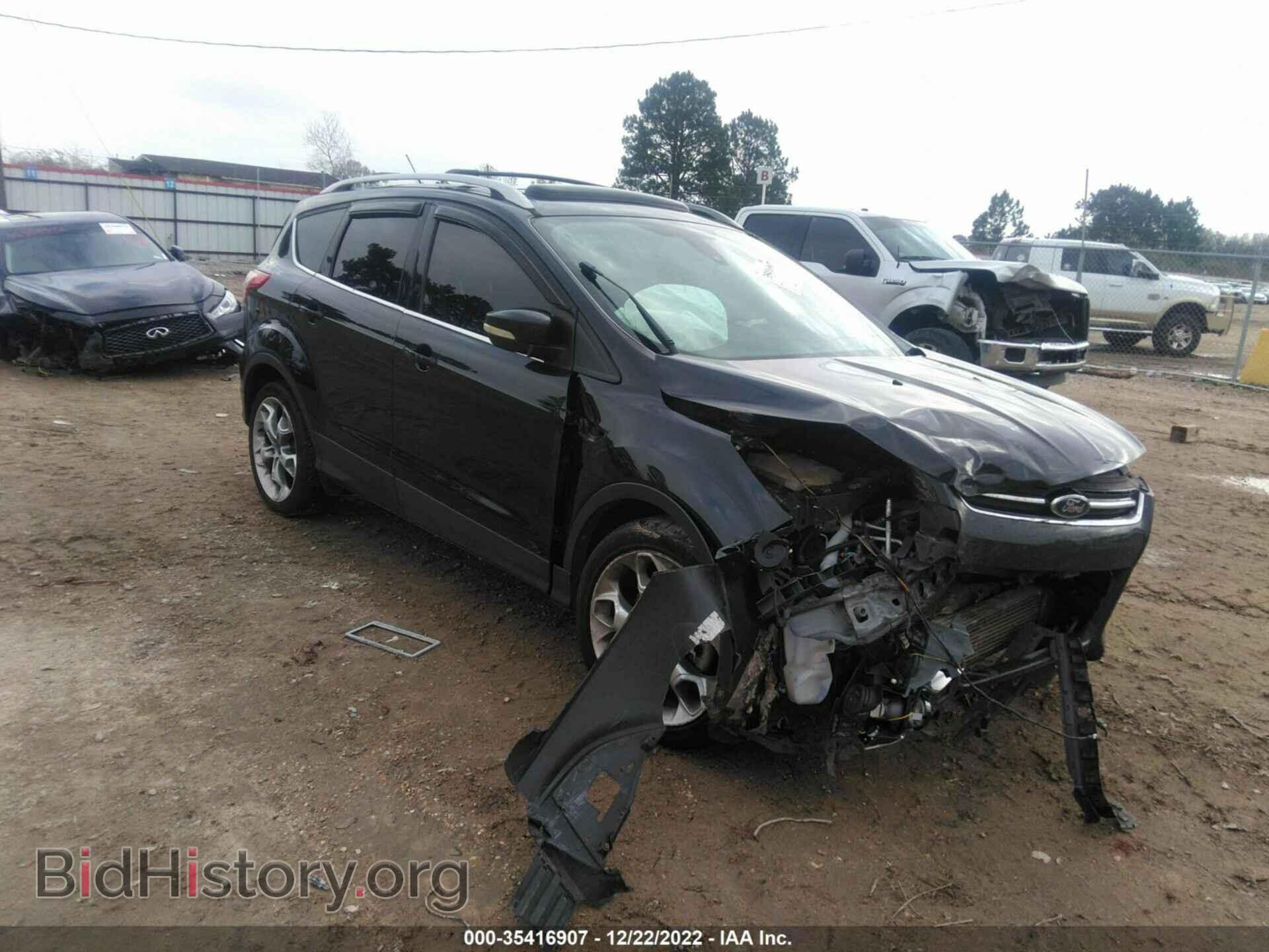 Фотография 1FMCU0J95EUD16875 - FORD ESCAPE 2014