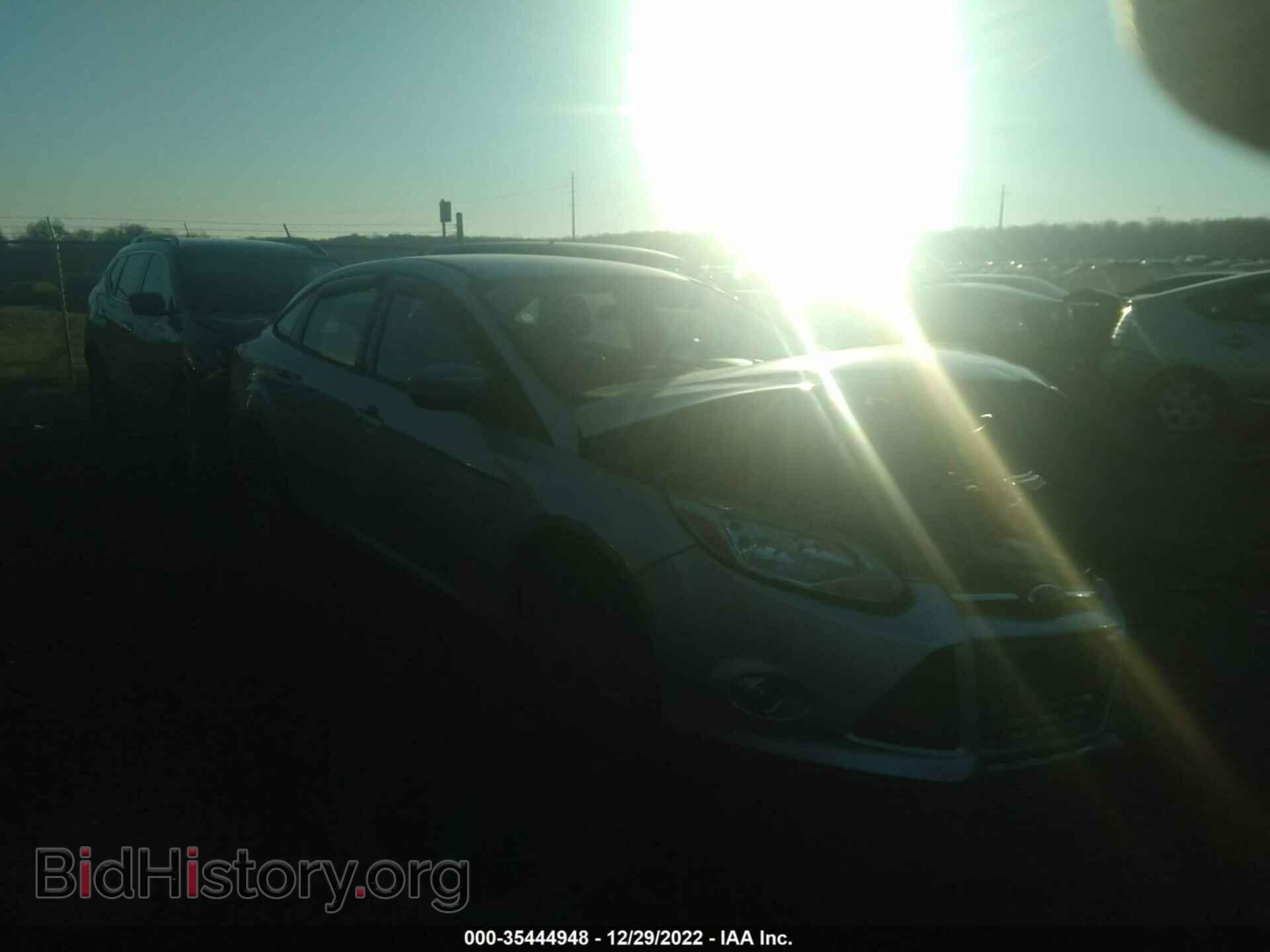 Фотография 1FADP3F29EL270010 - FORD FOCUS 2014