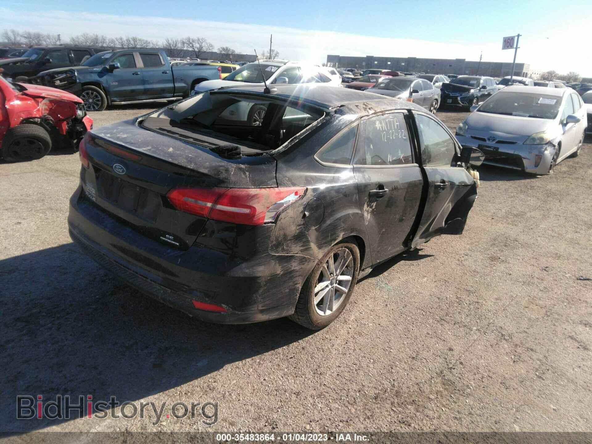 2015 FORD FOCUS - VIN: 1FADP3F26FL271049 - Photo 4